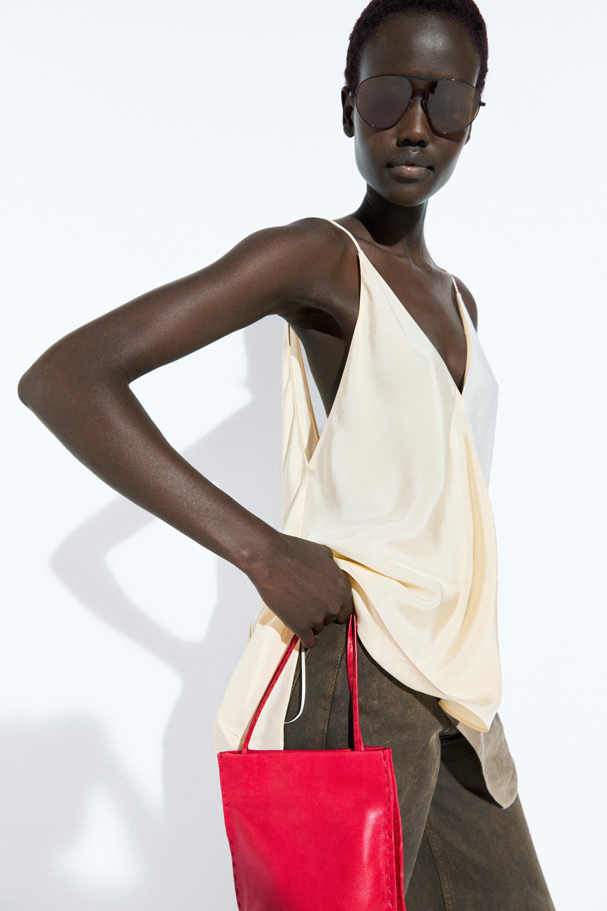 Asymmetric strappy flowing top — Ecru