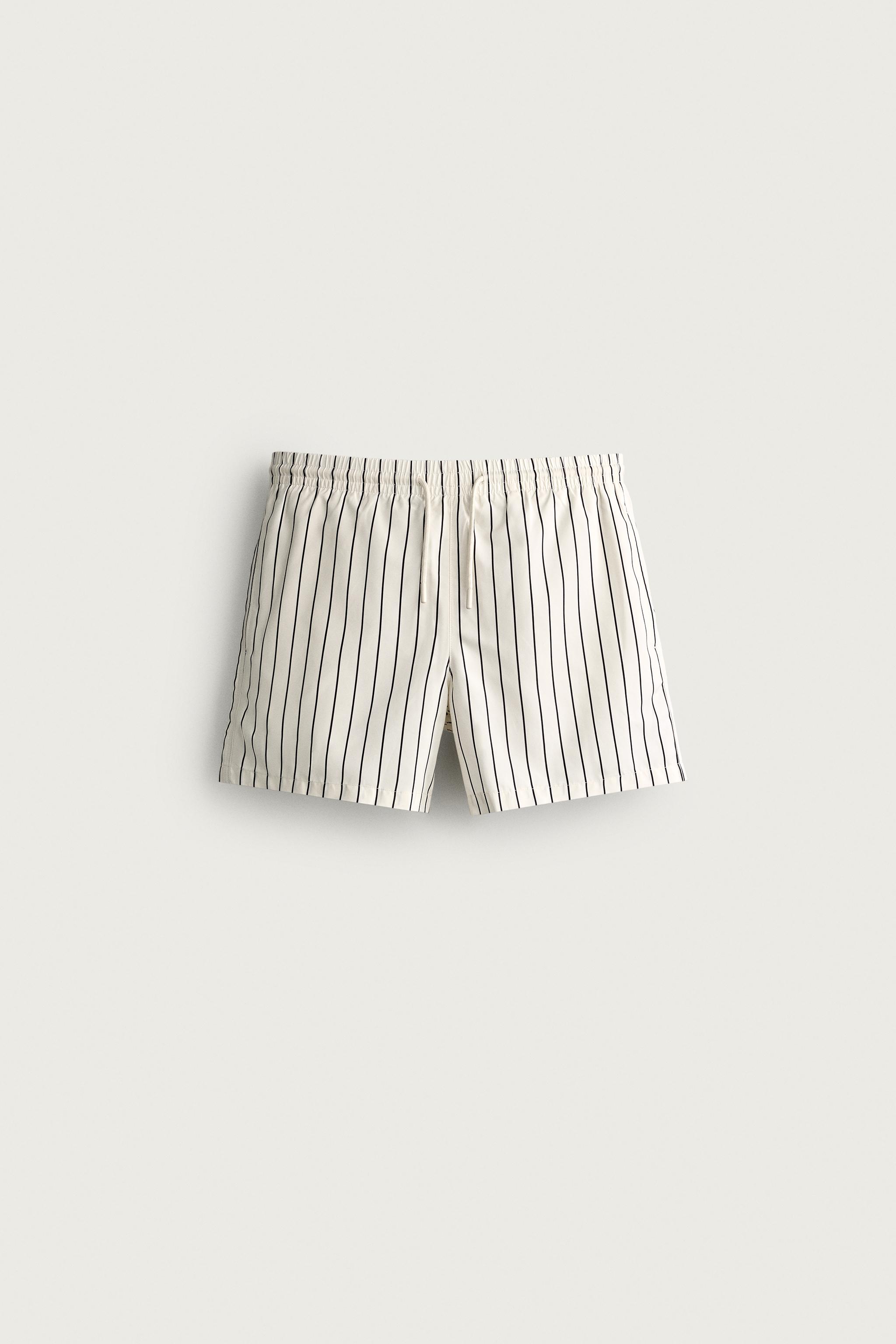 STRIPED MID-LENGTH SWIM TRUNKS