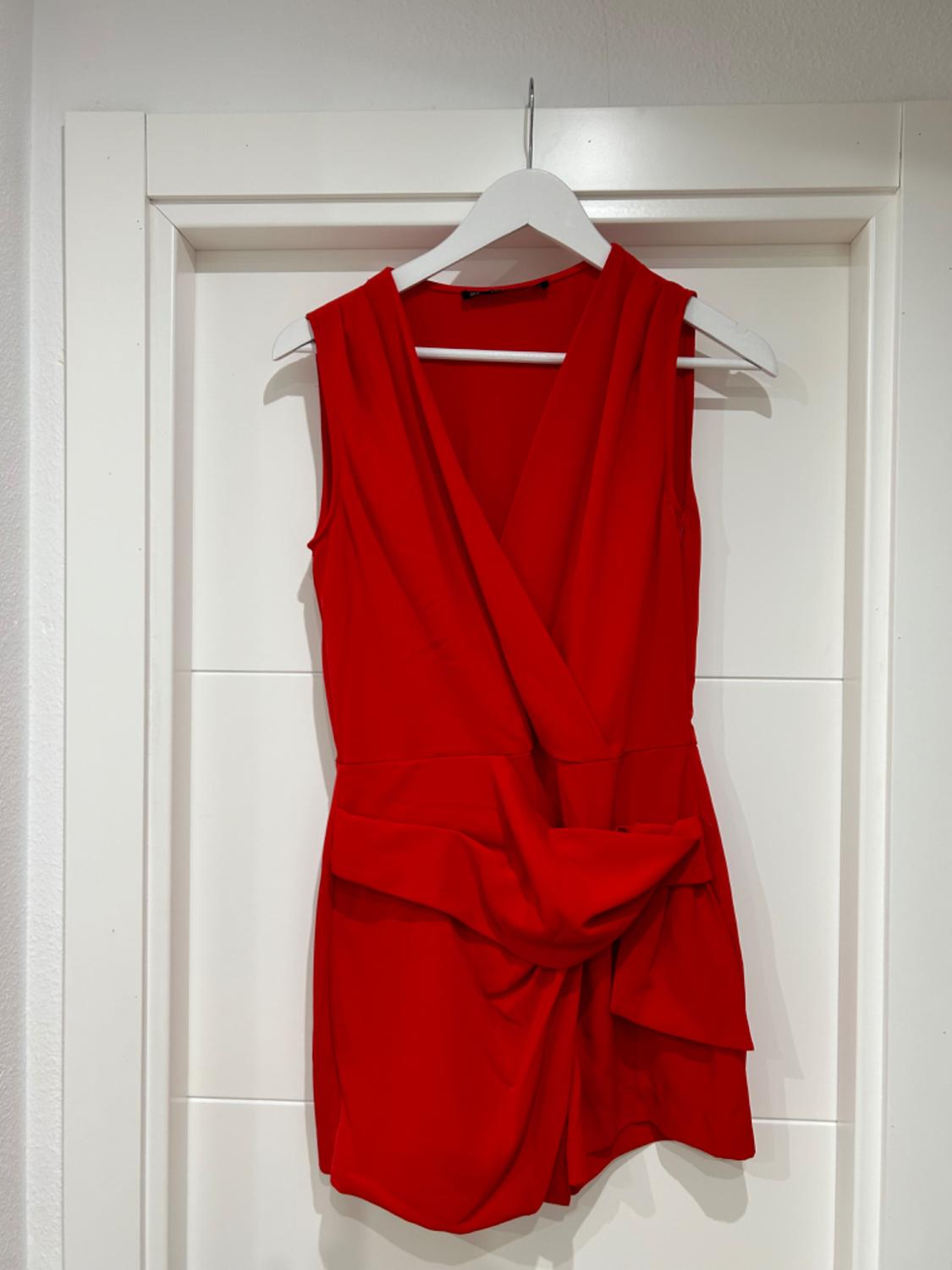 JUMPSUIT WITH SKORTS AND KNOT