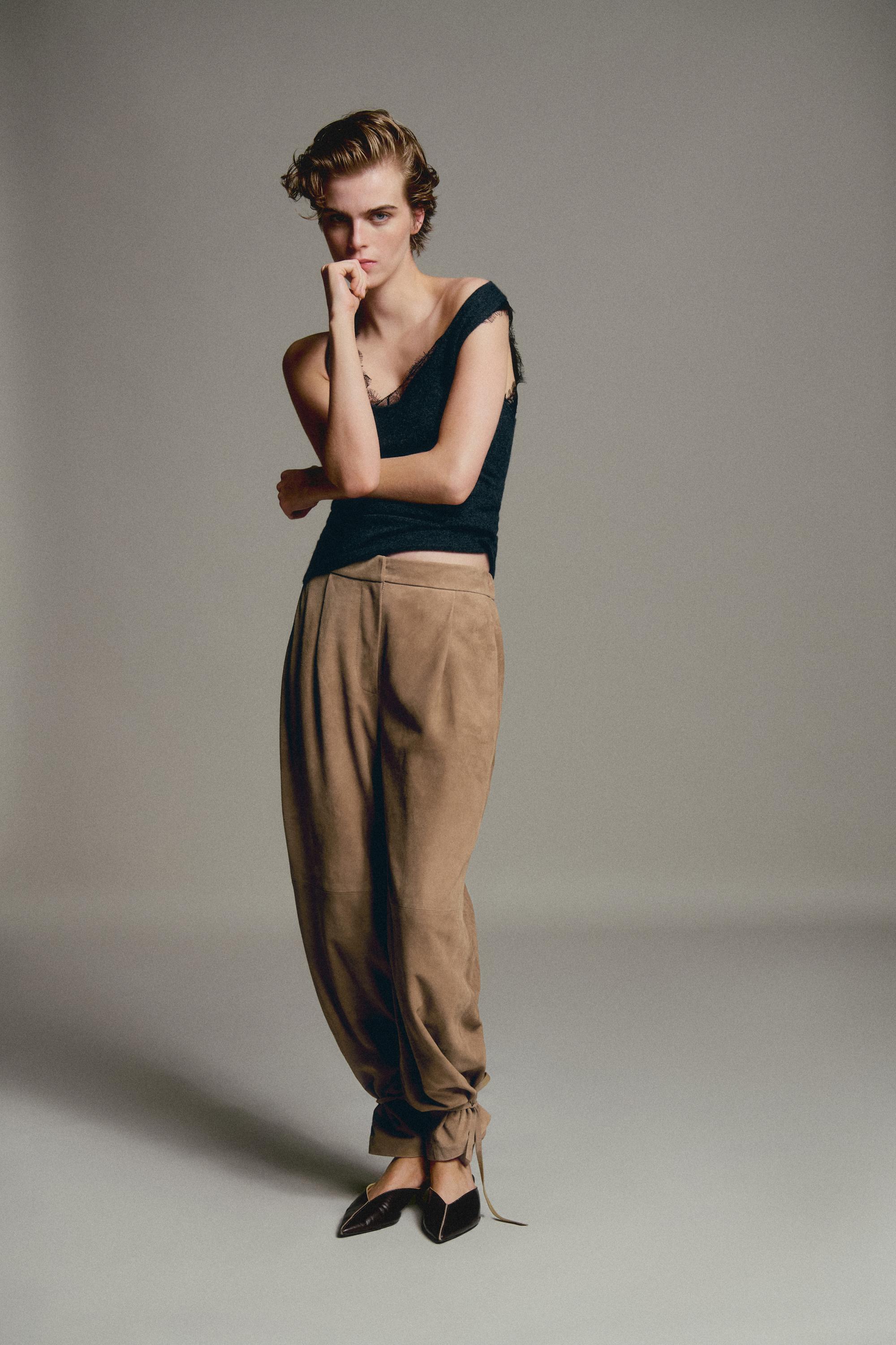 Suede leather pants with tie-detail hems — 553