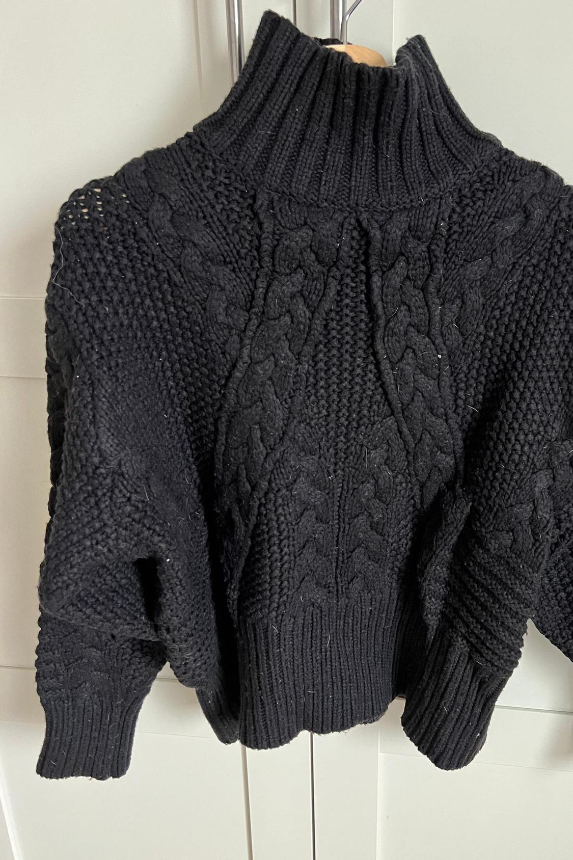 CABLE-KNIT SWEATER