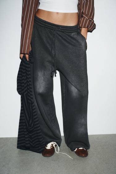 Zara WASHED EFFECT RIPPED FLEECE PANTS - Black