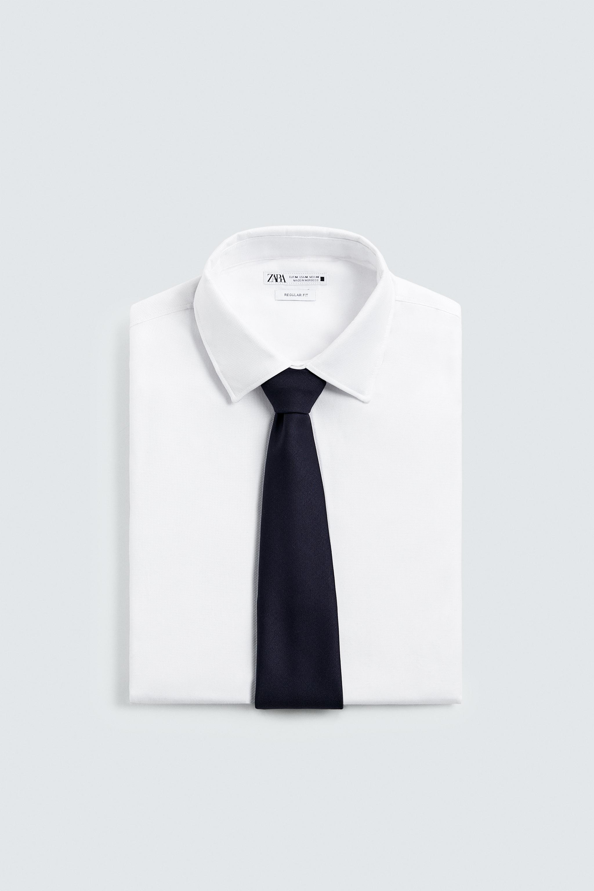 white shirt × black tie white-shirt-with-black-tie.jpg