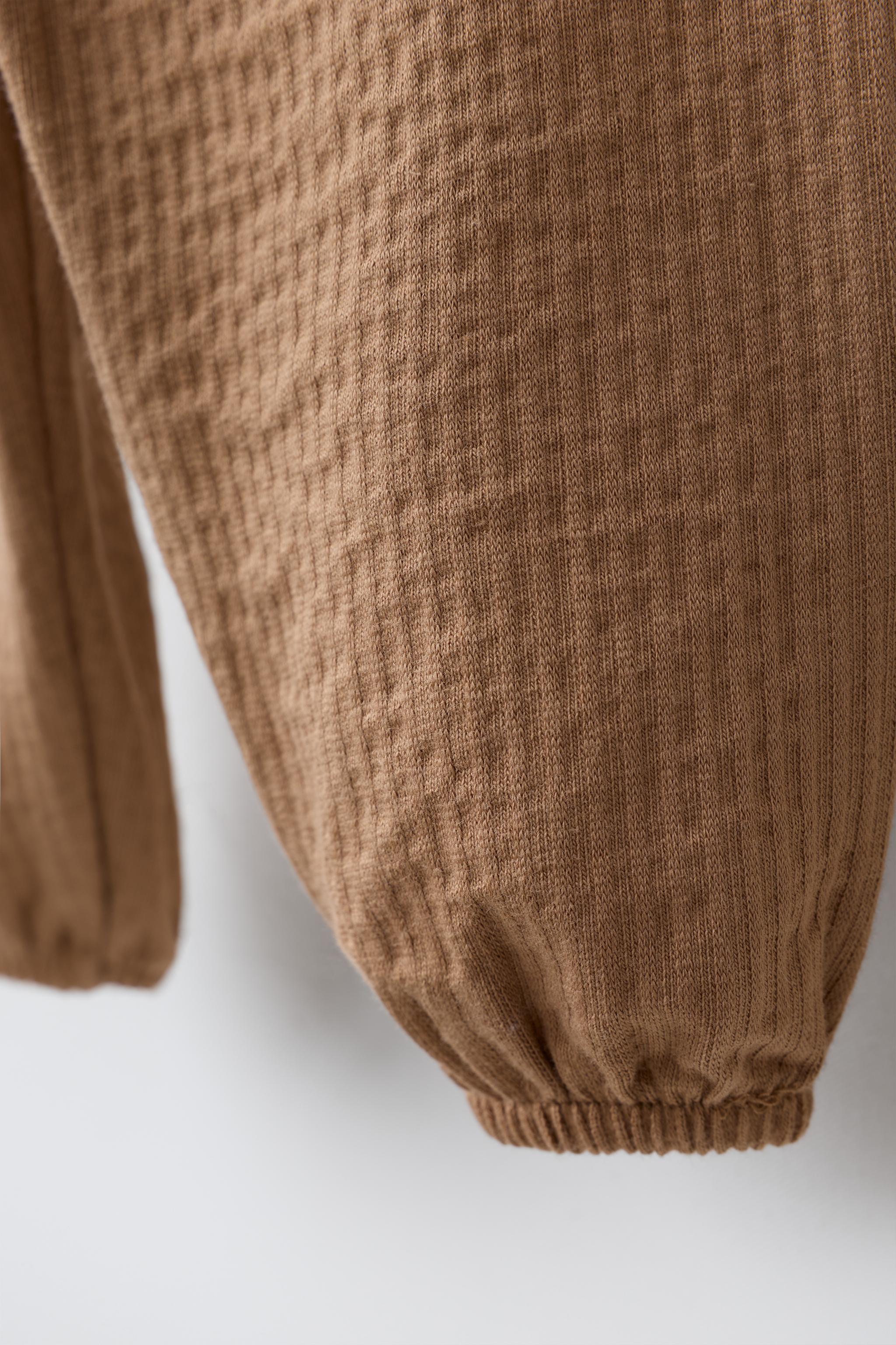 PANTALON TEXTURÉ UNI