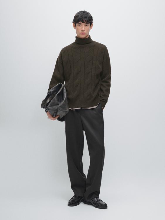 Wool blend knit sweater with high neck