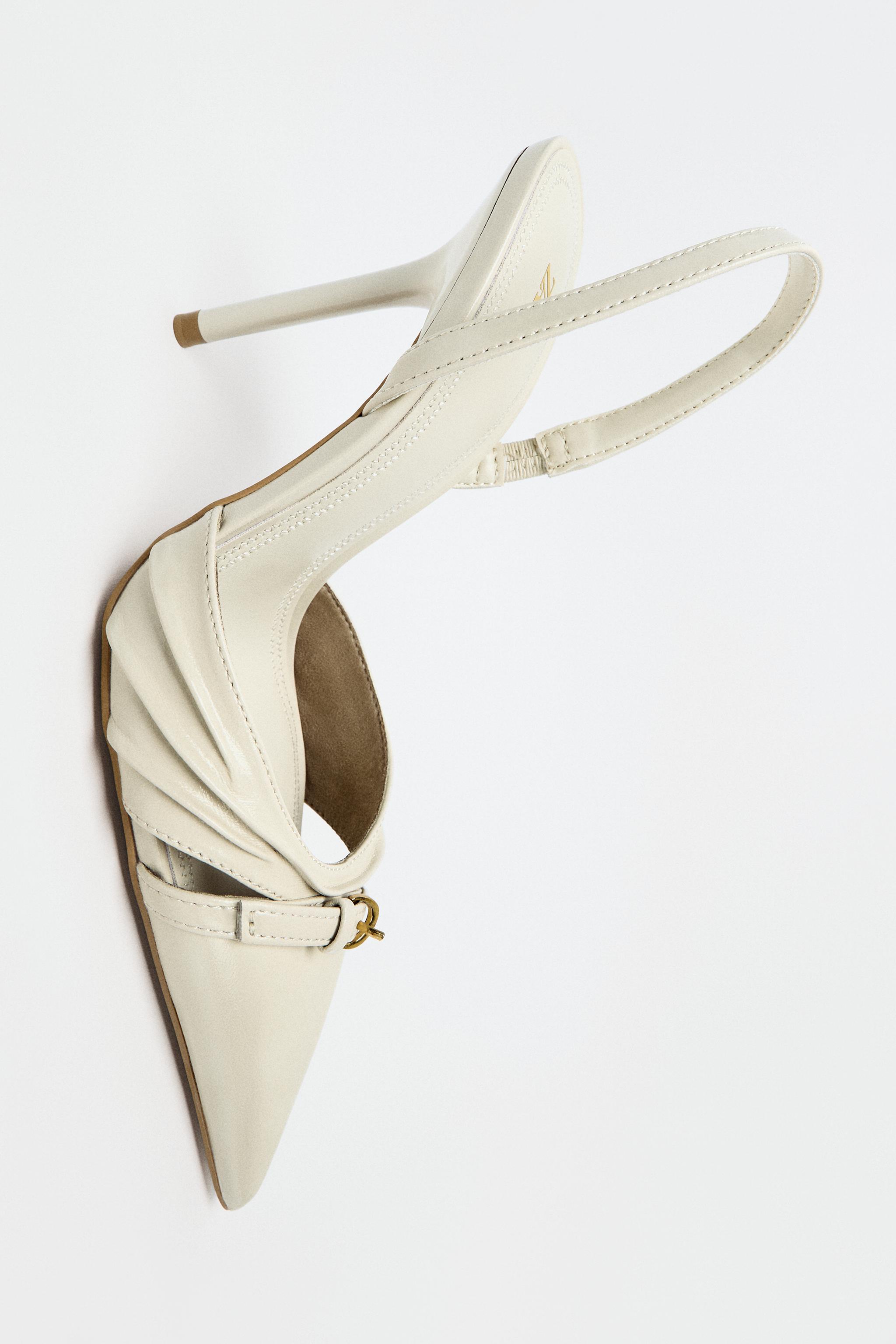 BUCKLED SLINGBACK HEELS — Ecru