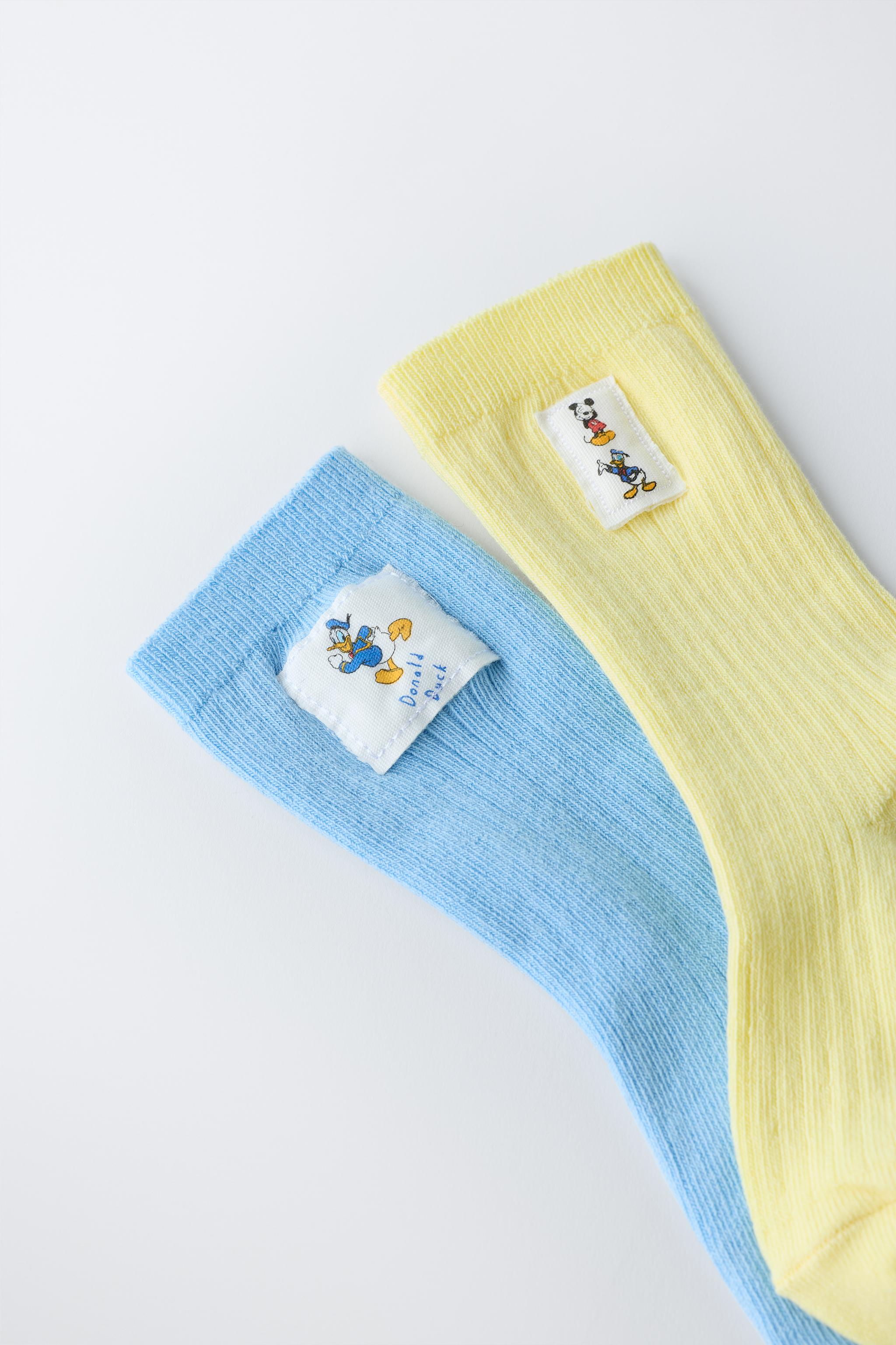 TWO-PACK OF MICKEY MOUSE AND DONALD DUCK LONG SOCKS © DISNEY