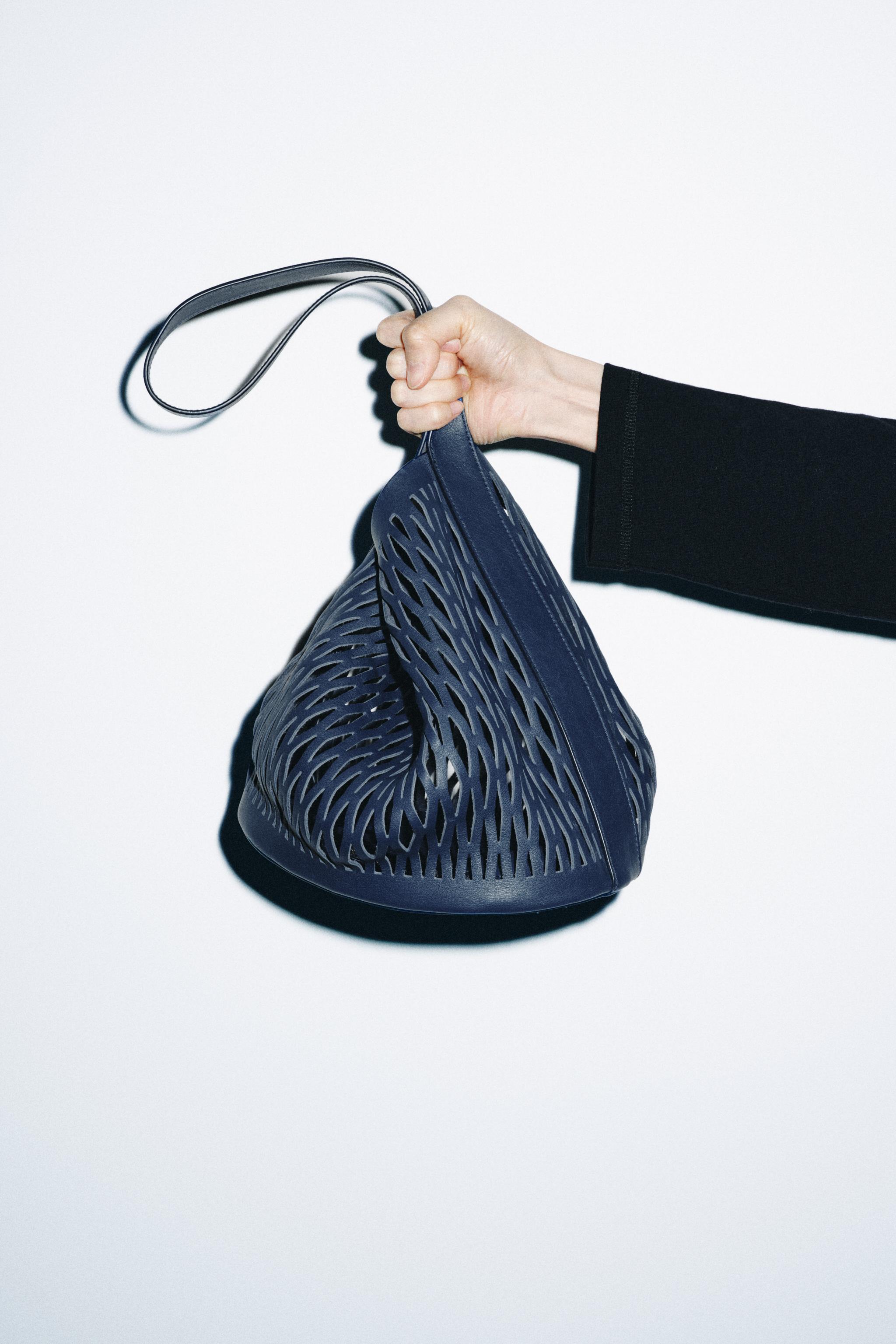 DIE-CUT LEATHER BAG