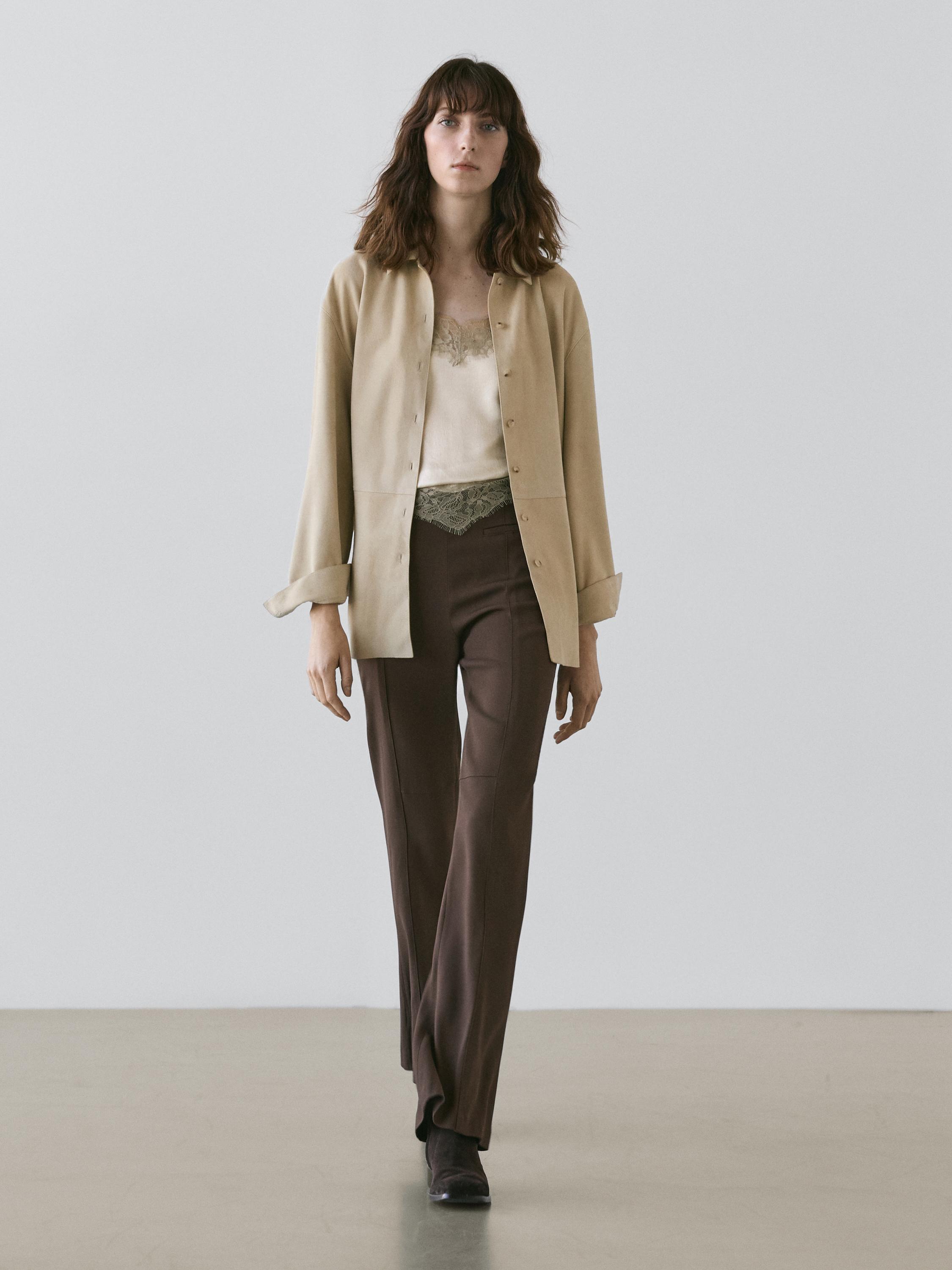 Flared trousers with pocket — Brown