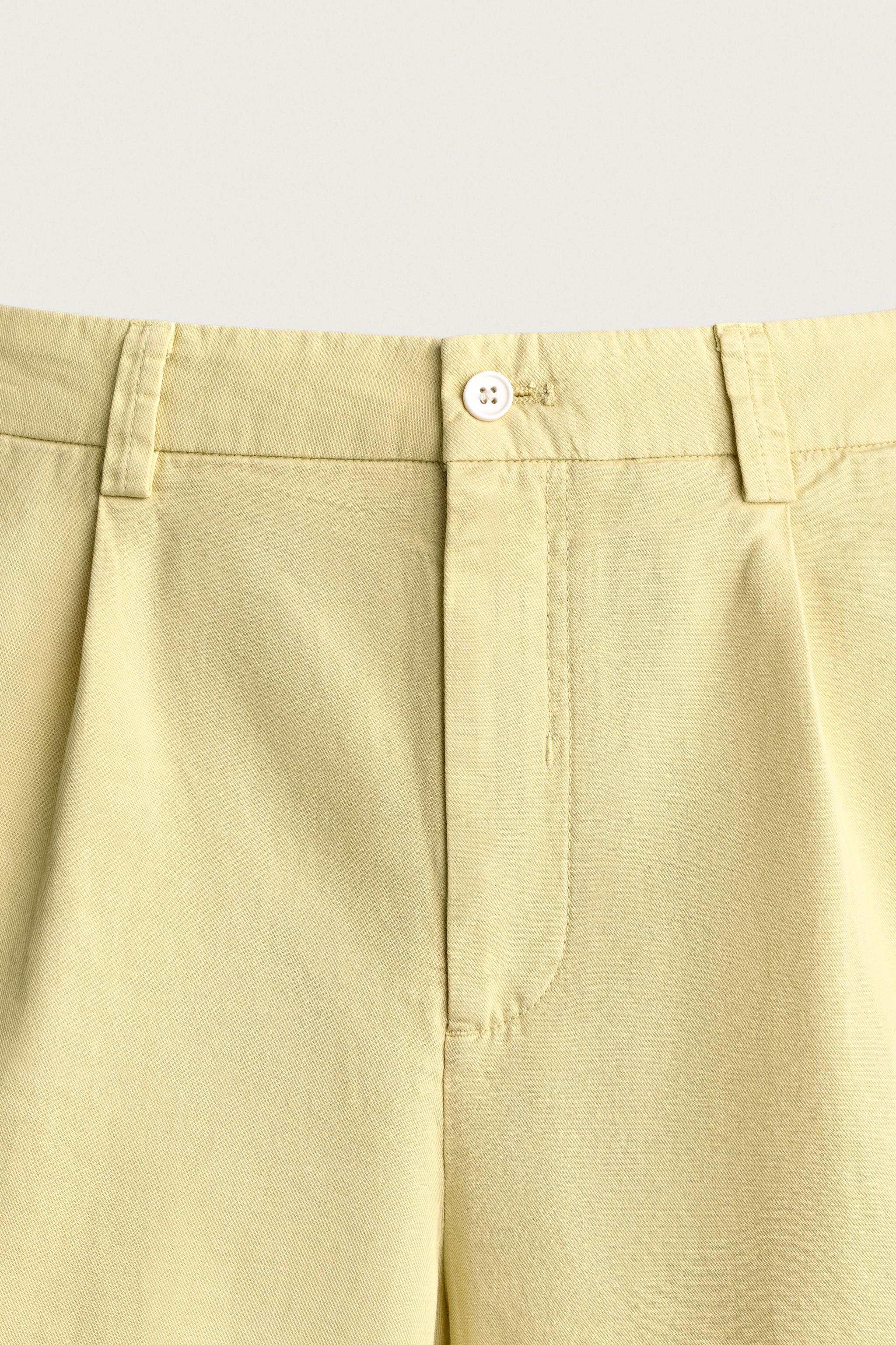 REGULAR FIT PLEATED BERMUDA SHORTS