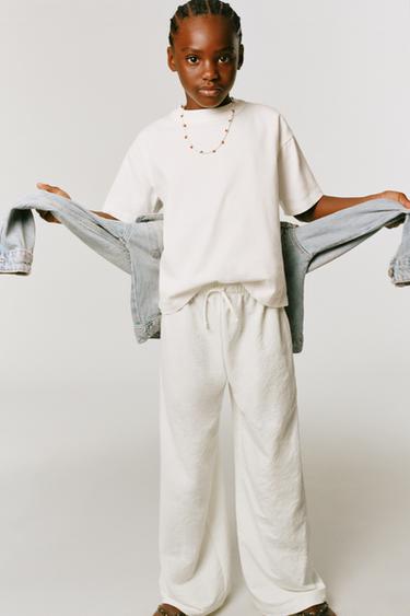 PANTALÓN WIDE LEG FLUIDO - Crudo de Zara - Imagen 0