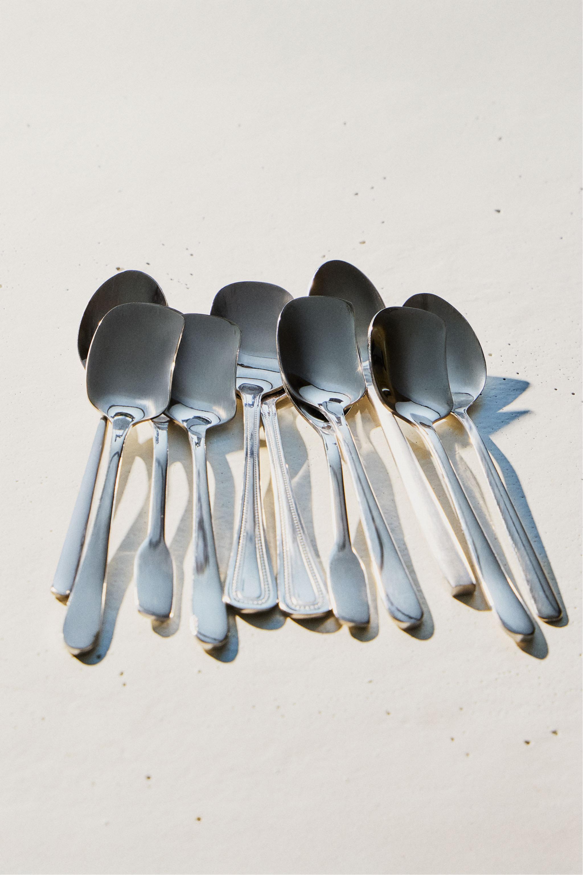 PACK OF STEEL DESSERT SPOONS — Steel