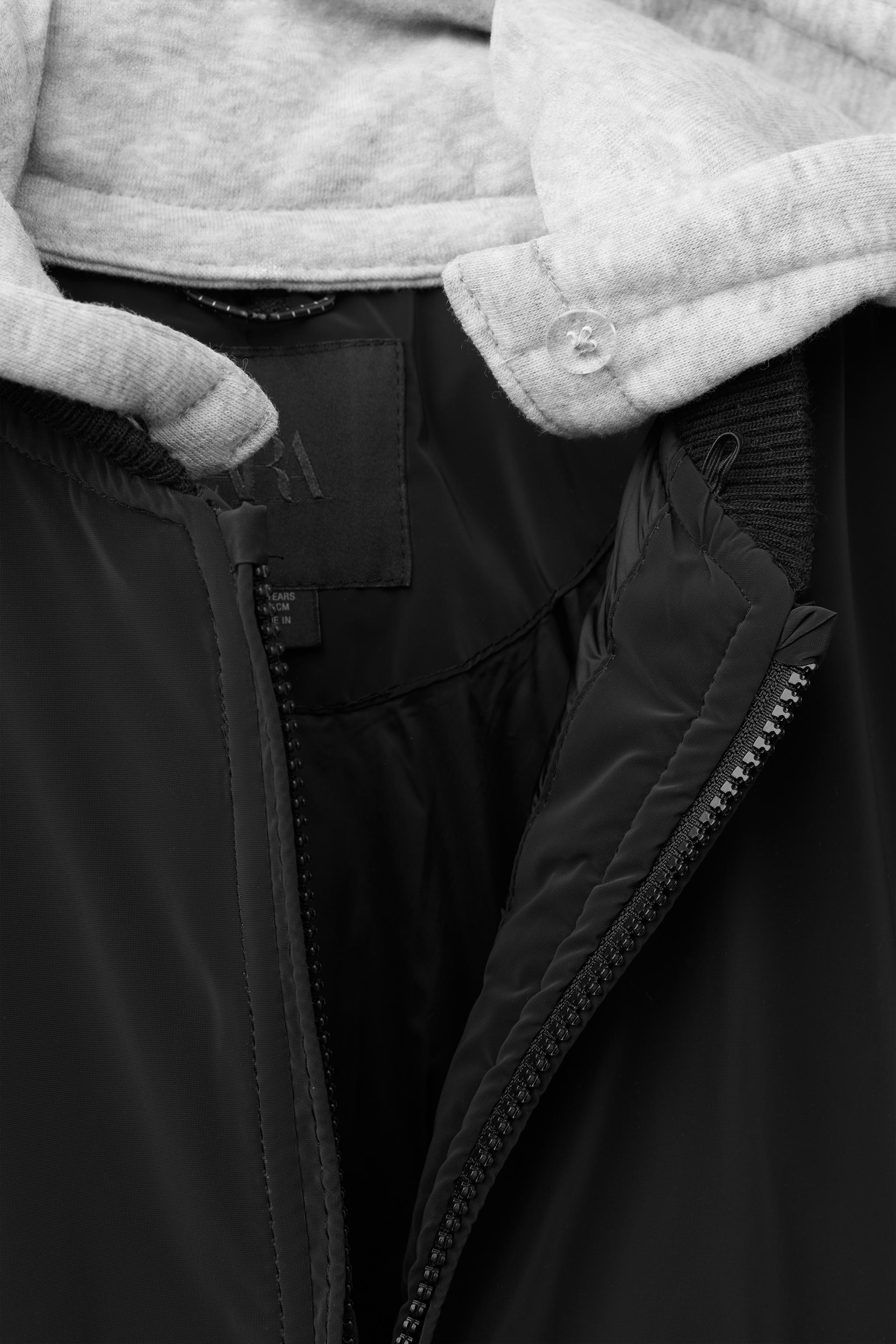 RUBBERIZED BOMBER JACKET WITH DETACHABLE HOOD