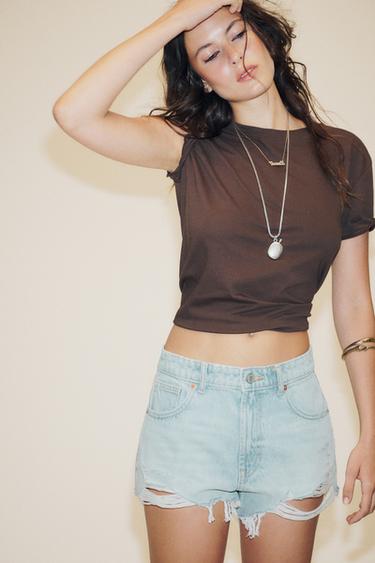 SHORTS DENIM TRF CURVED بسرج عال - أزرق فاتح الخاص بـ Zara