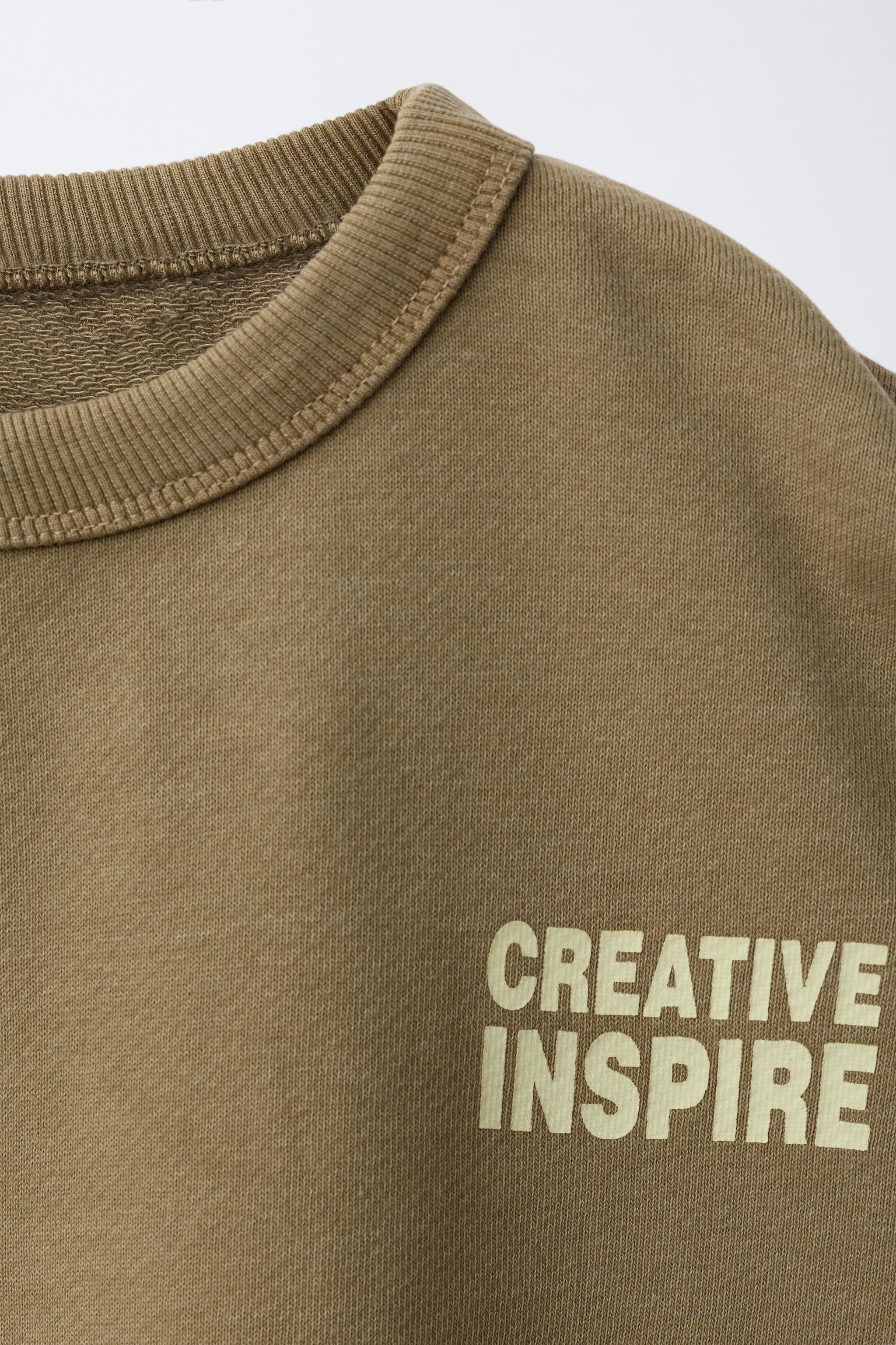 PRINTED TEXT SWEATSHIRT