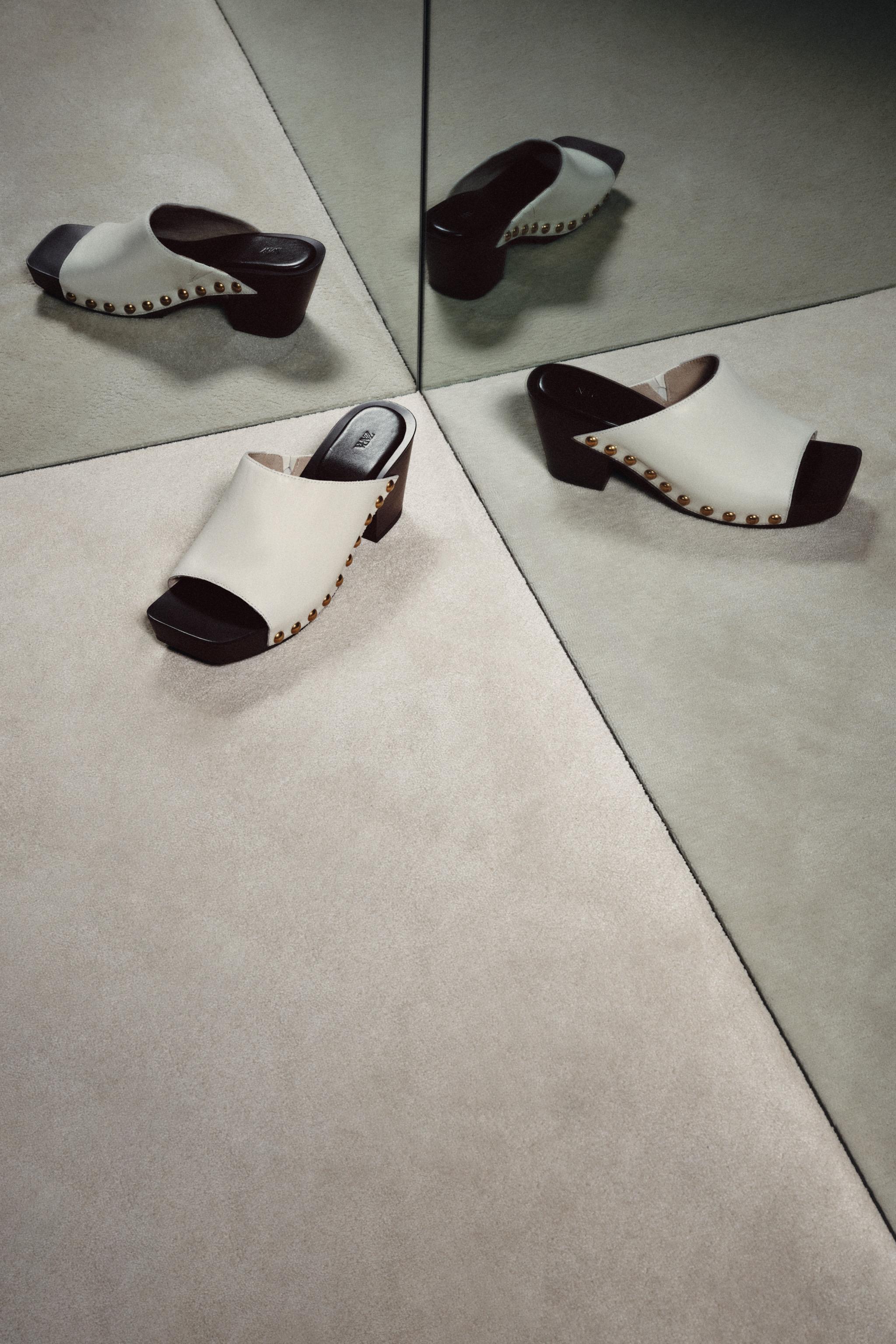 CHAUSSURES COMPENSÉES EN CUIR À CLOUS ÉDITION LIMITÉE