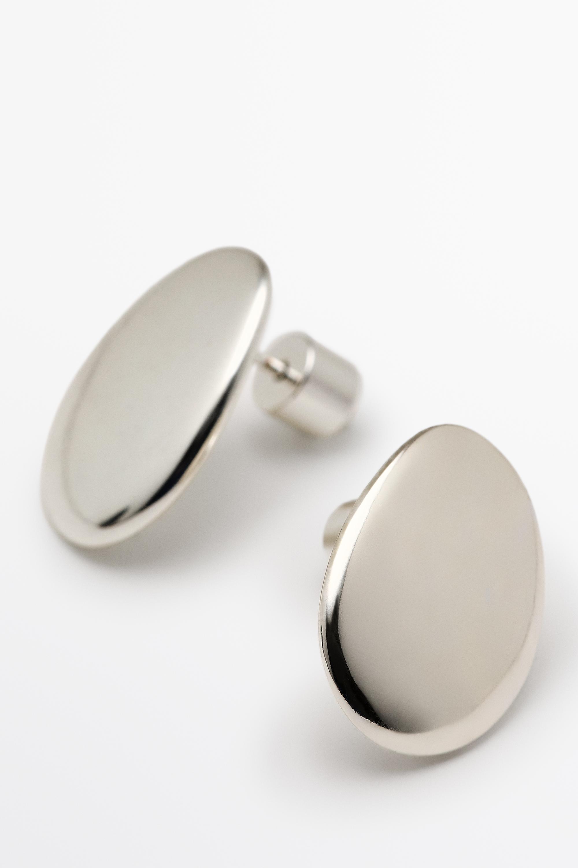 Boucle d'oreille plate irrégulière