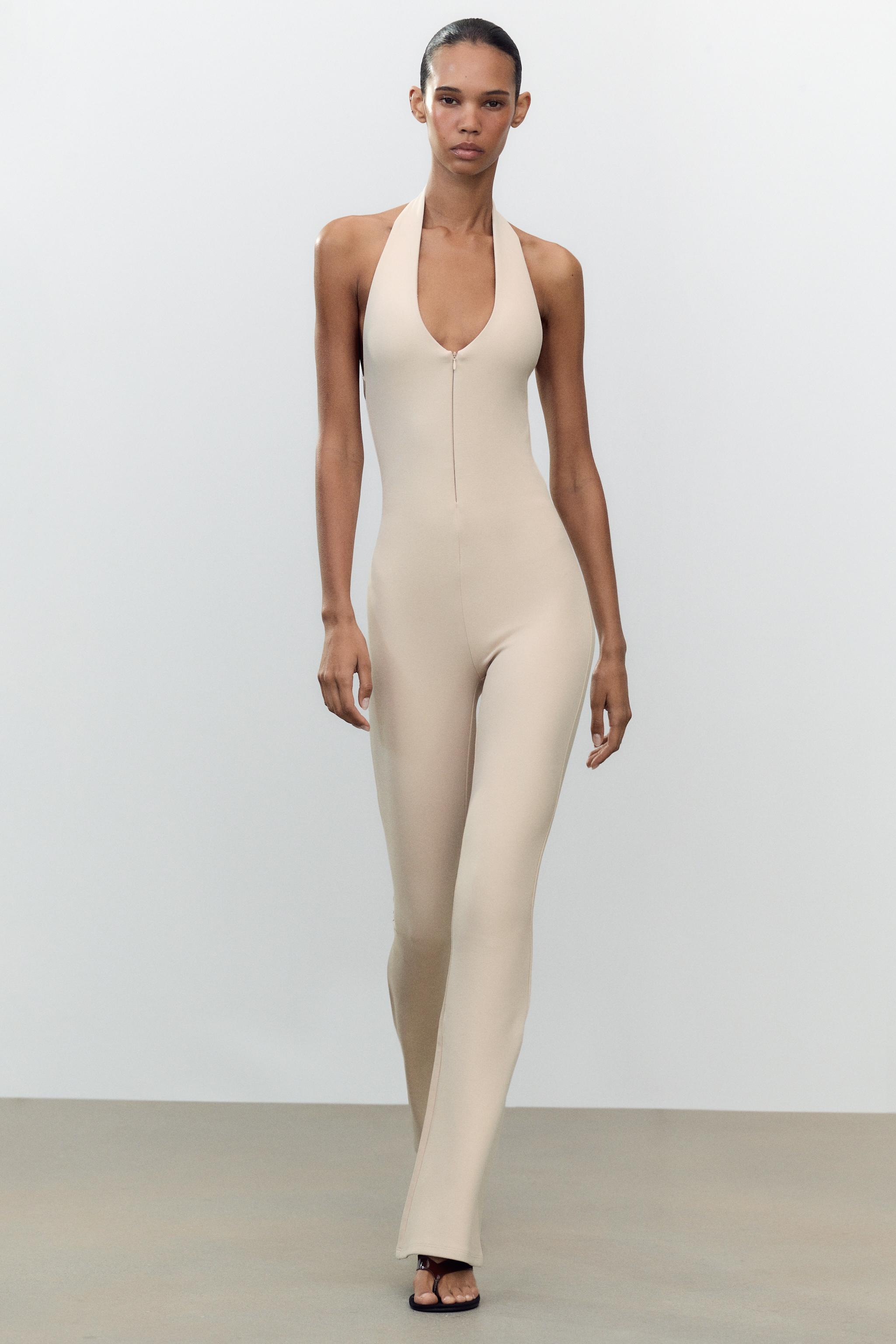 LONG HALTER INTERLOCK JUMPSUIT