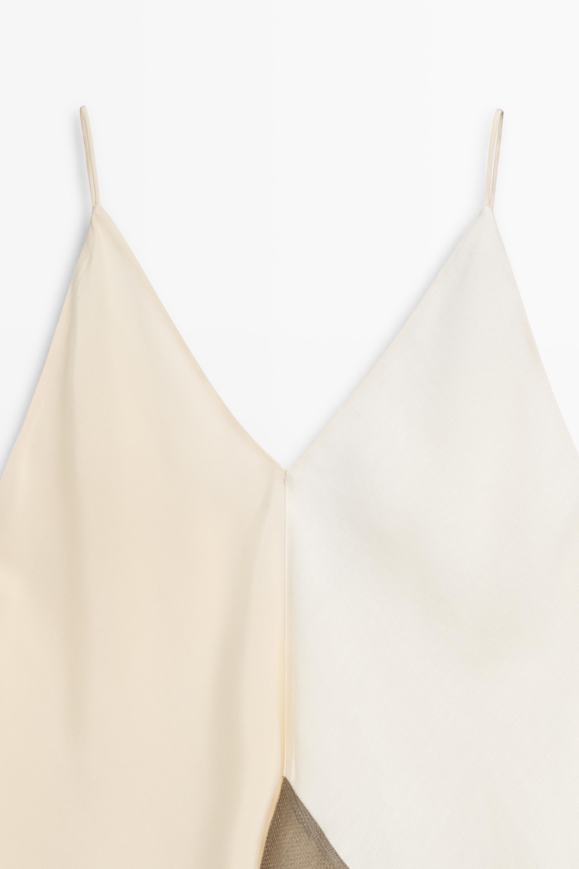 Top fluide asymétrique à fines bretelles