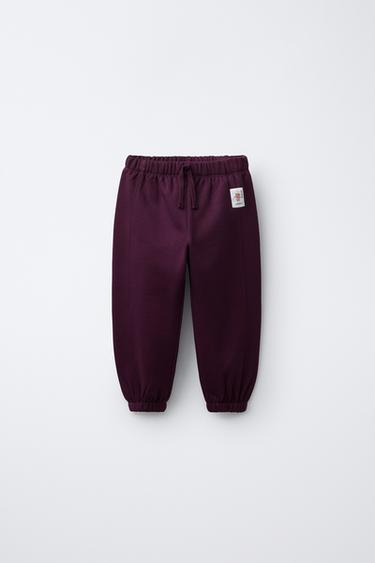 PLUSH JOGGING BOTTOMS WITH LABEL APPLIQUÉ - Dark aubergine by Zara