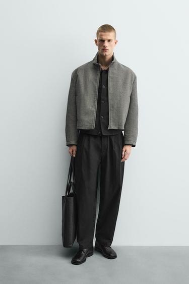 PANTALÓN RELAXED FIT PLIEGUES - Negro de Zara