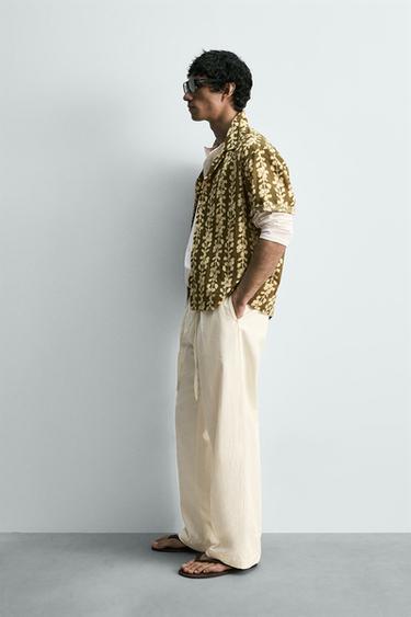 PANTALON À PLIS EN COTON ET LIN - Écru de Zara - Image 3