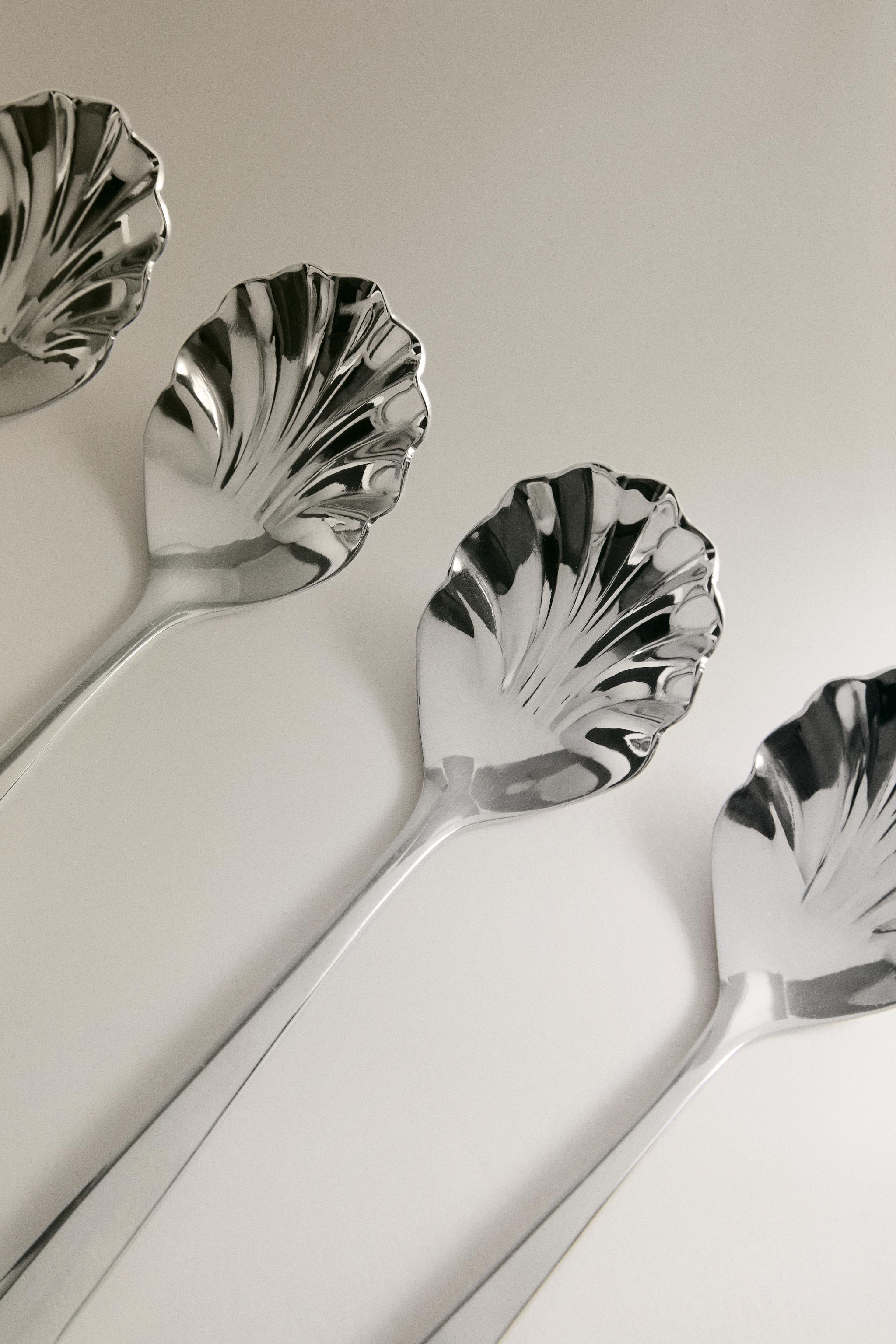 PACK OF STEEL SHELL DESSERT SPOONS (PACK OF 4) — Steel