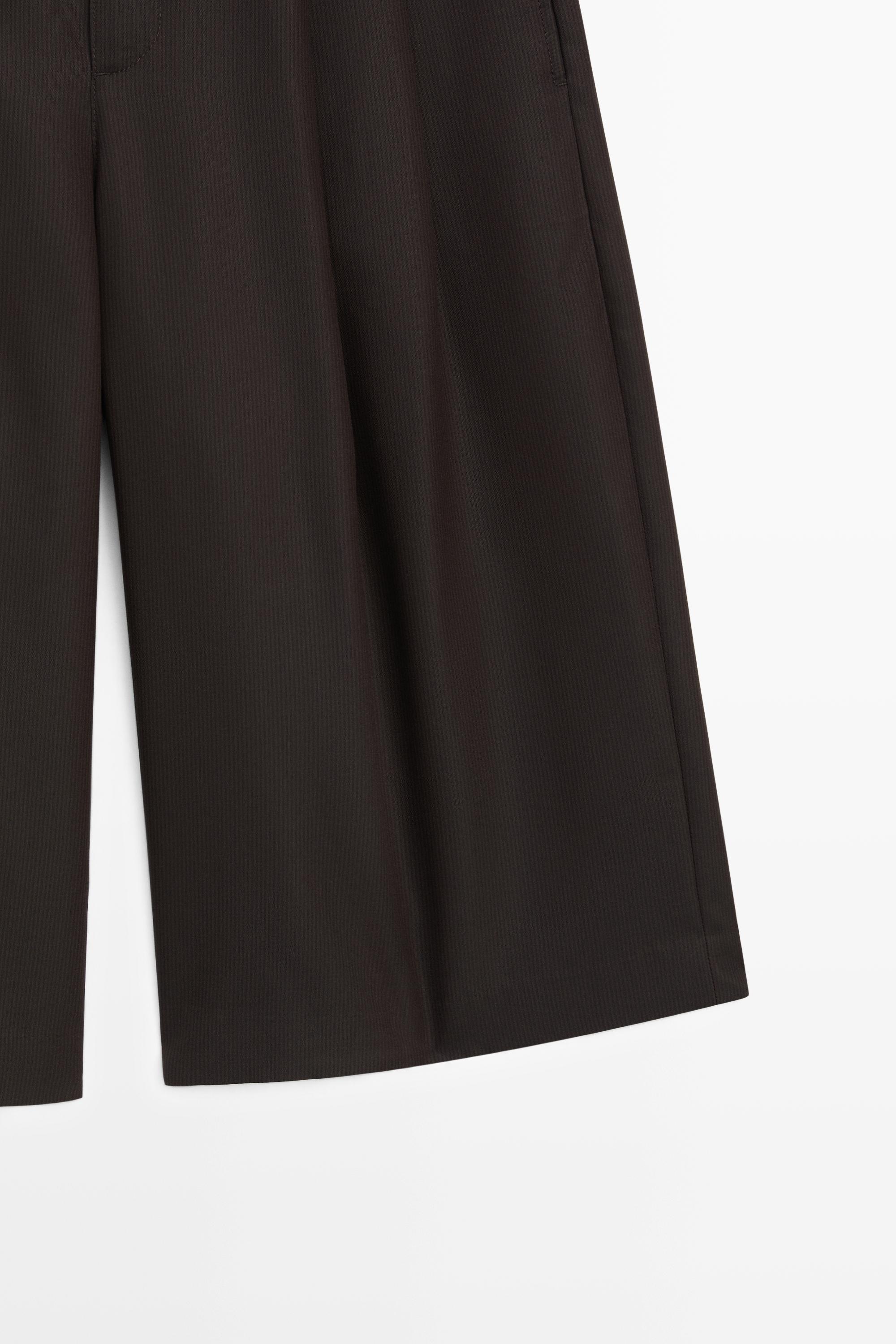 Long Bermuda shorts with striped detail