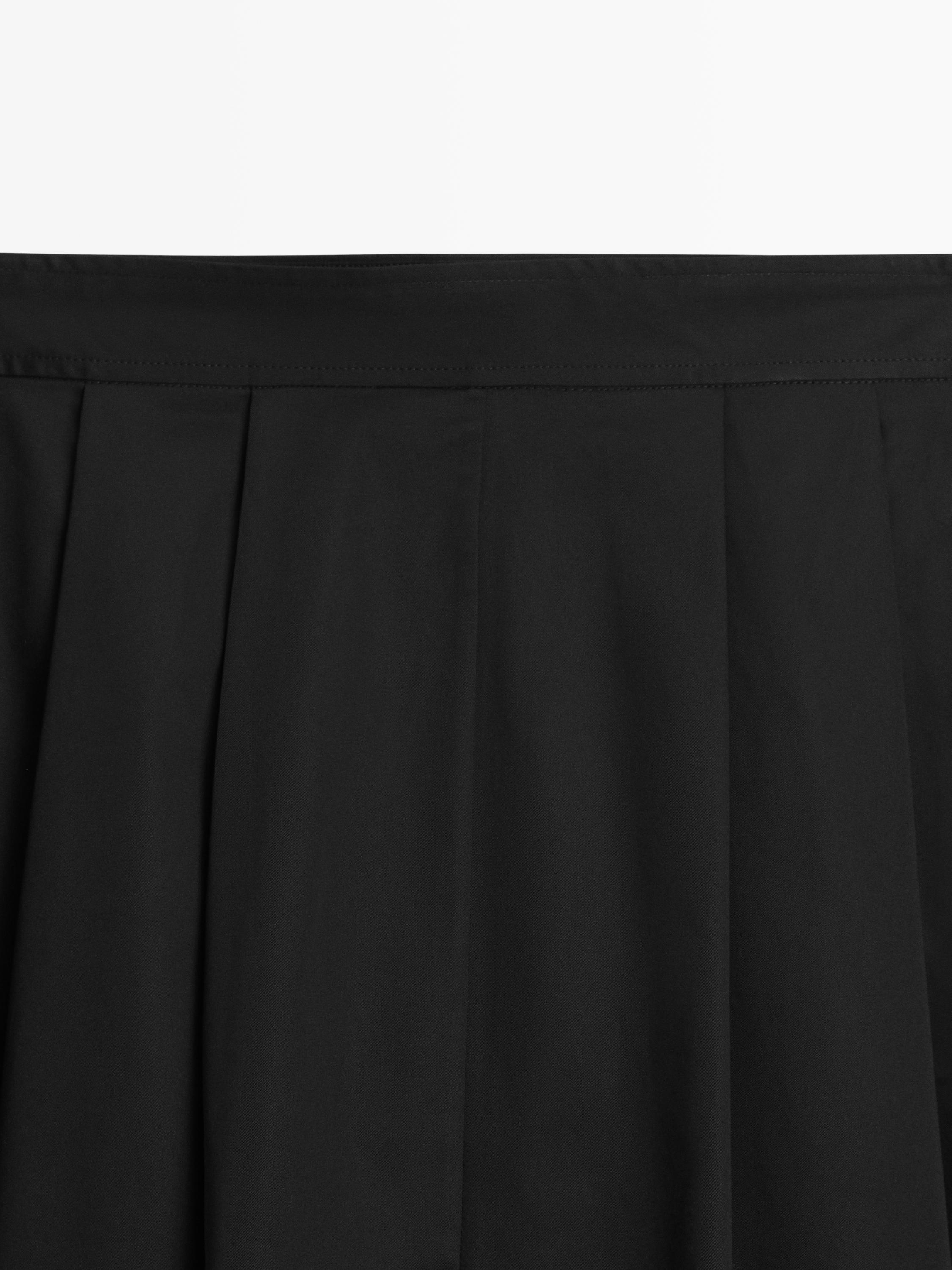 Midi skirt with box pleats