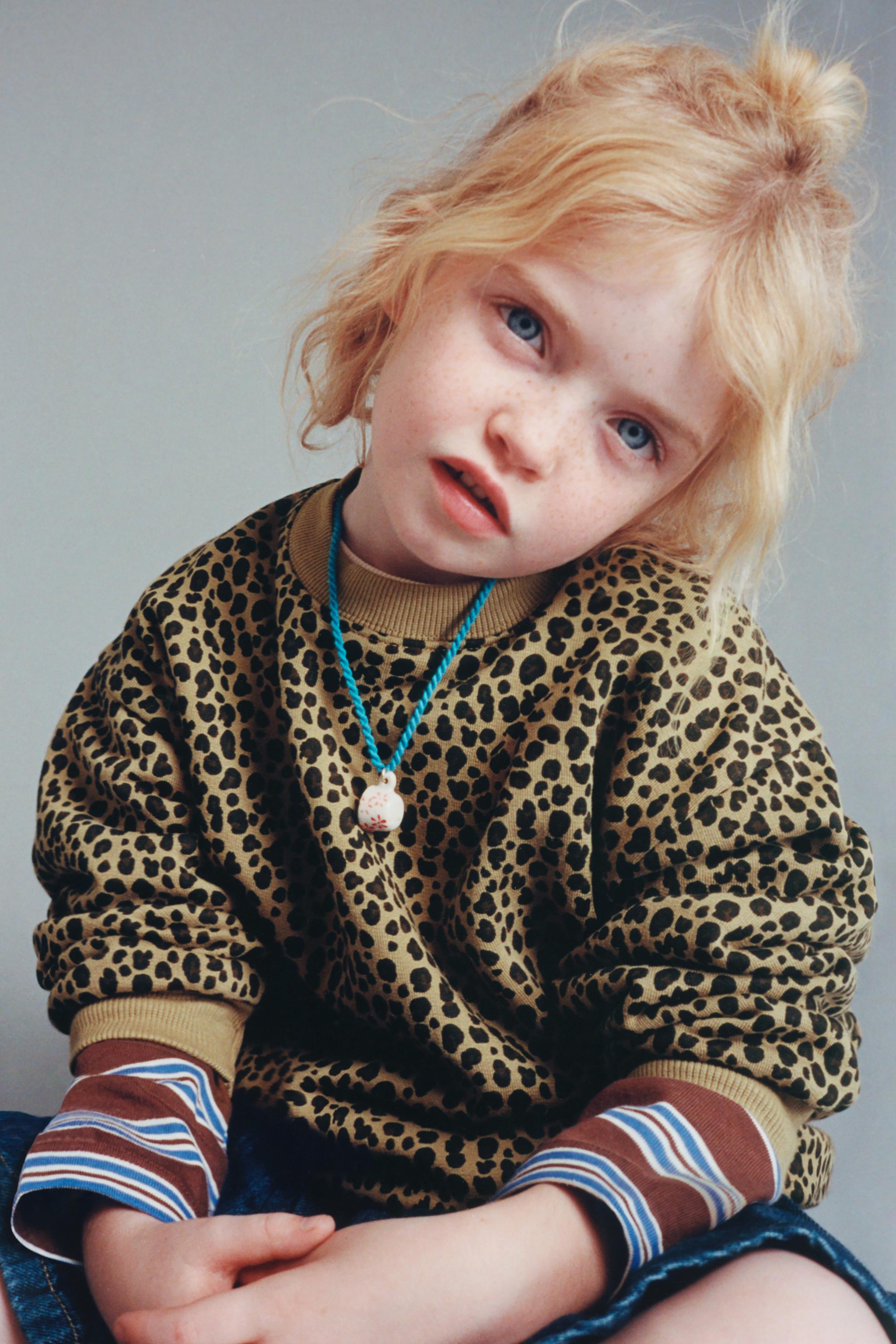 HEAVYWEIGHT ANIMAL PRINT SWEATSHIRT