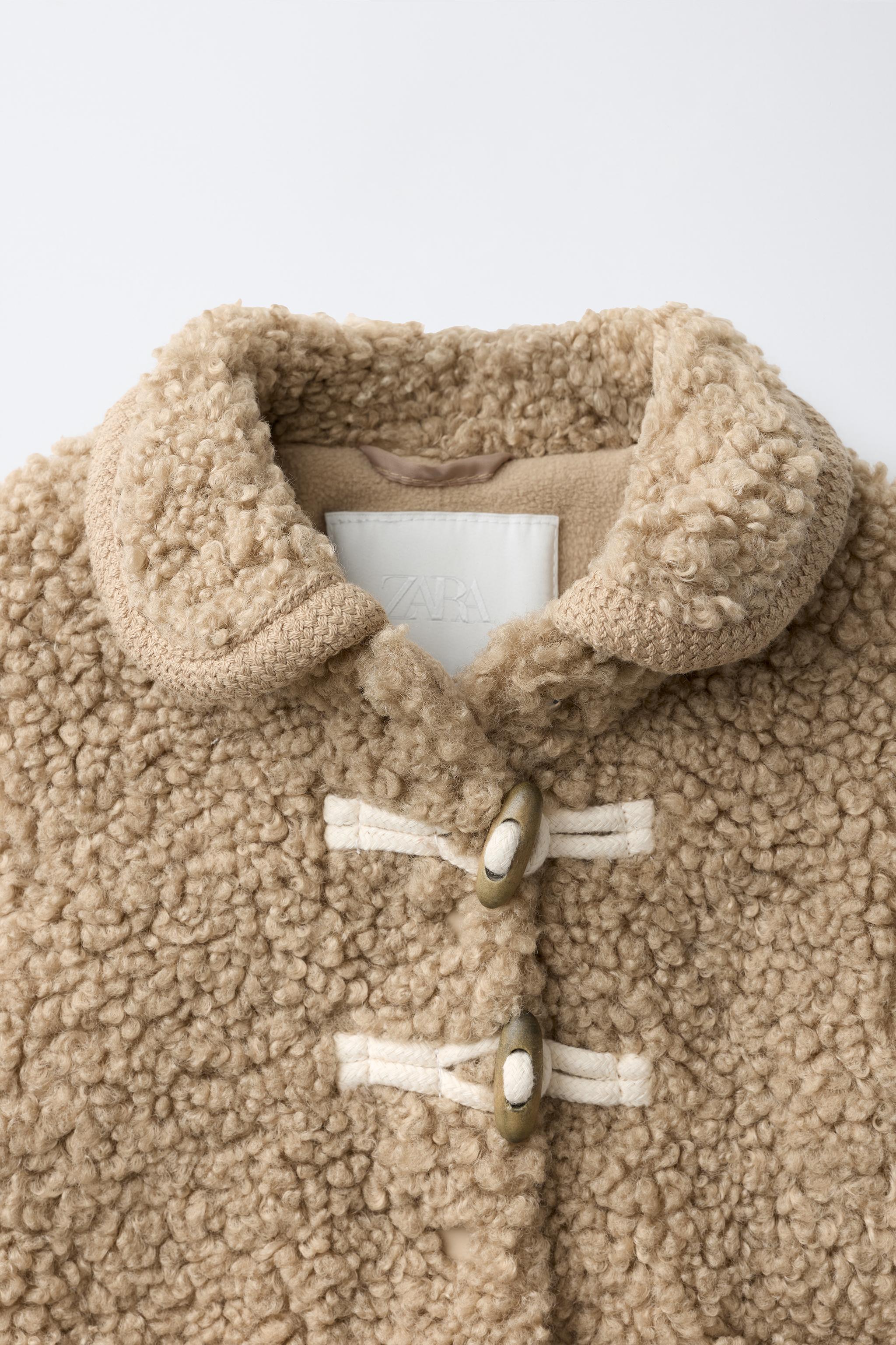 BLOUSON EN DAIM À BRANDEBOURGS