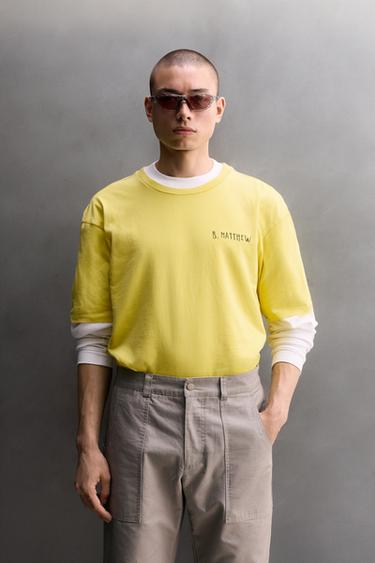 CAMISETA RELAXED FIT TEXTO ESTAMPADO - Amarillo de Zara
