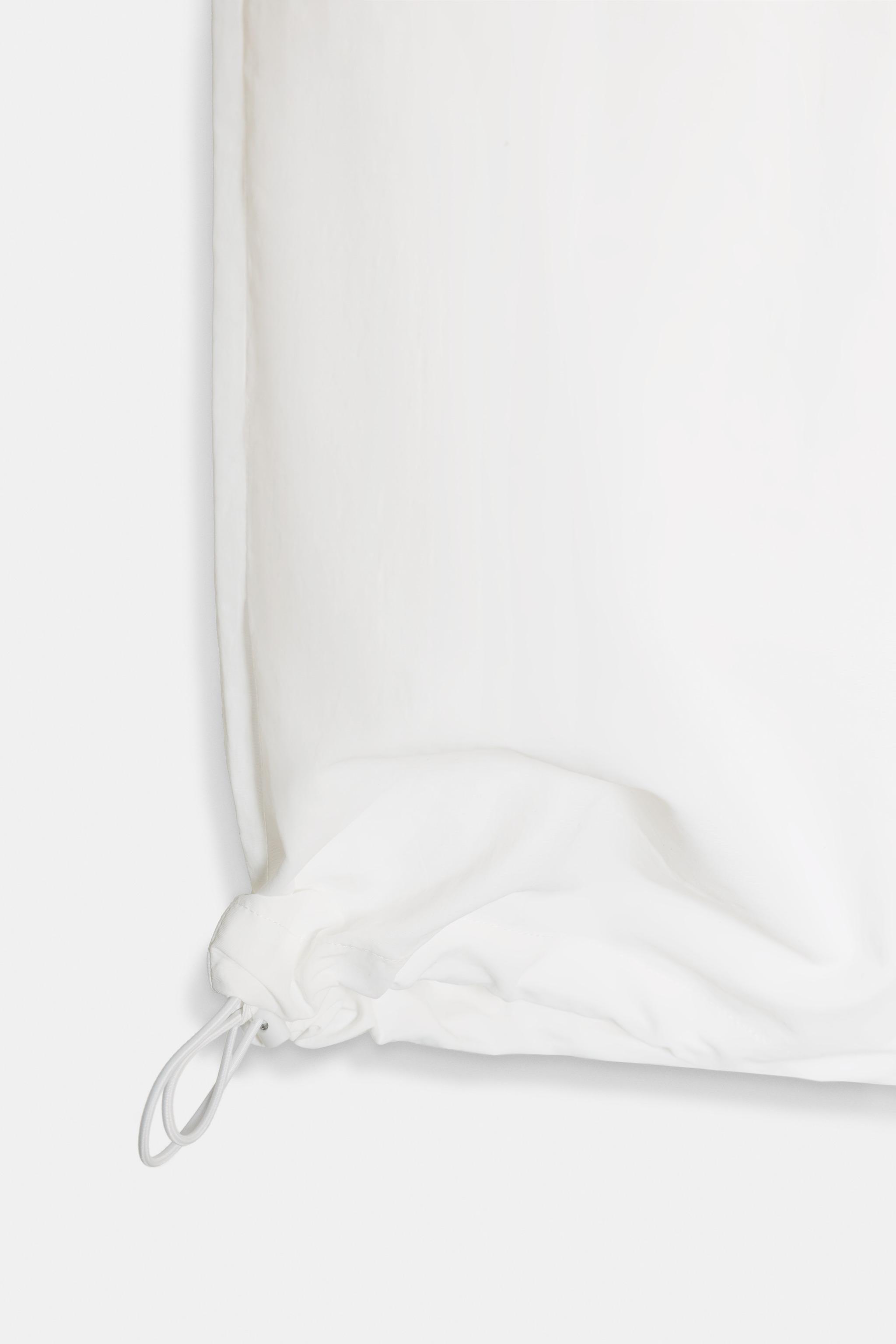 PANTALON EN NYLON À TAILLE SUPERPOSÉE
