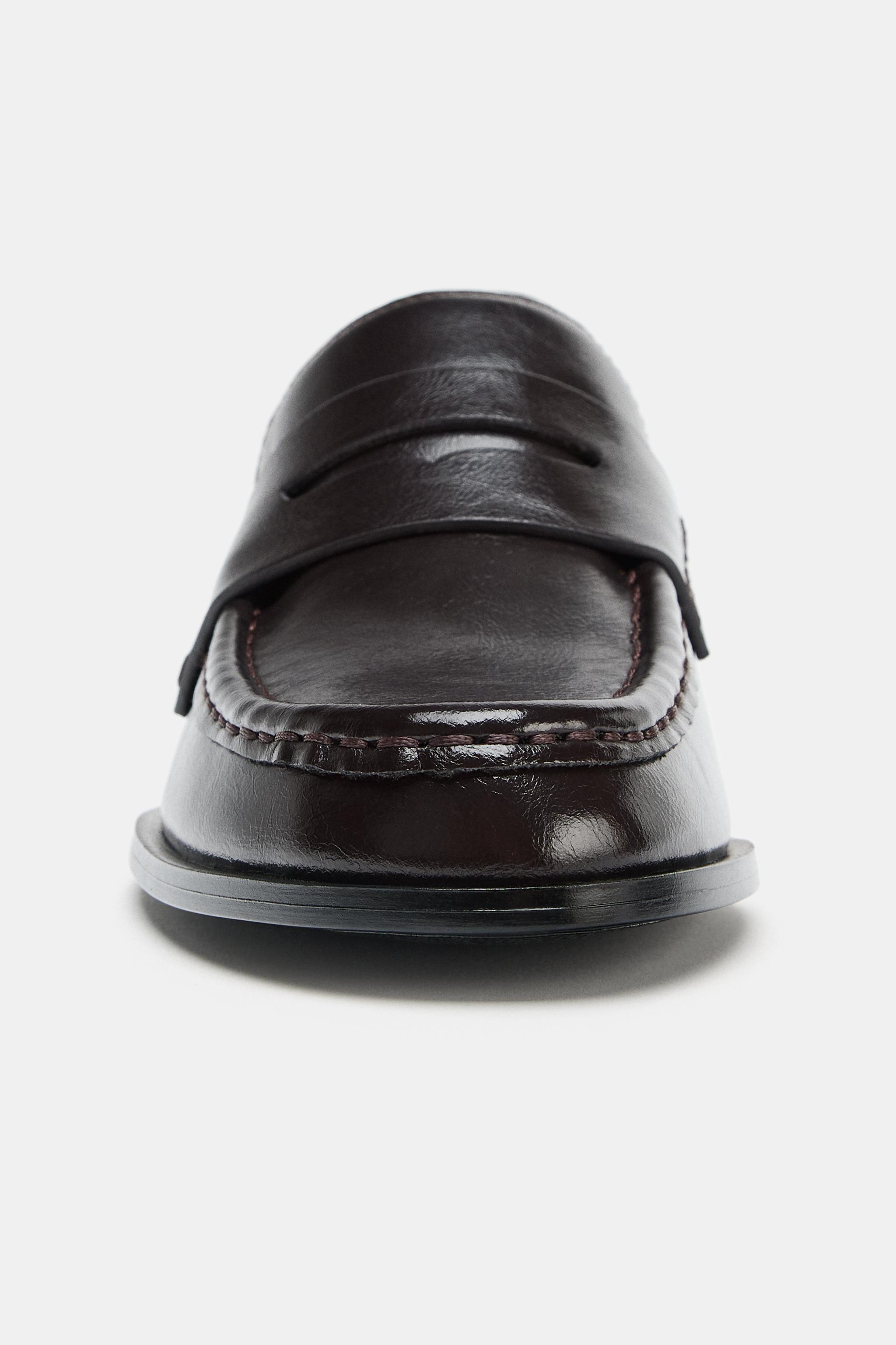 MOCASSINS À CLAUQE MONTANTE