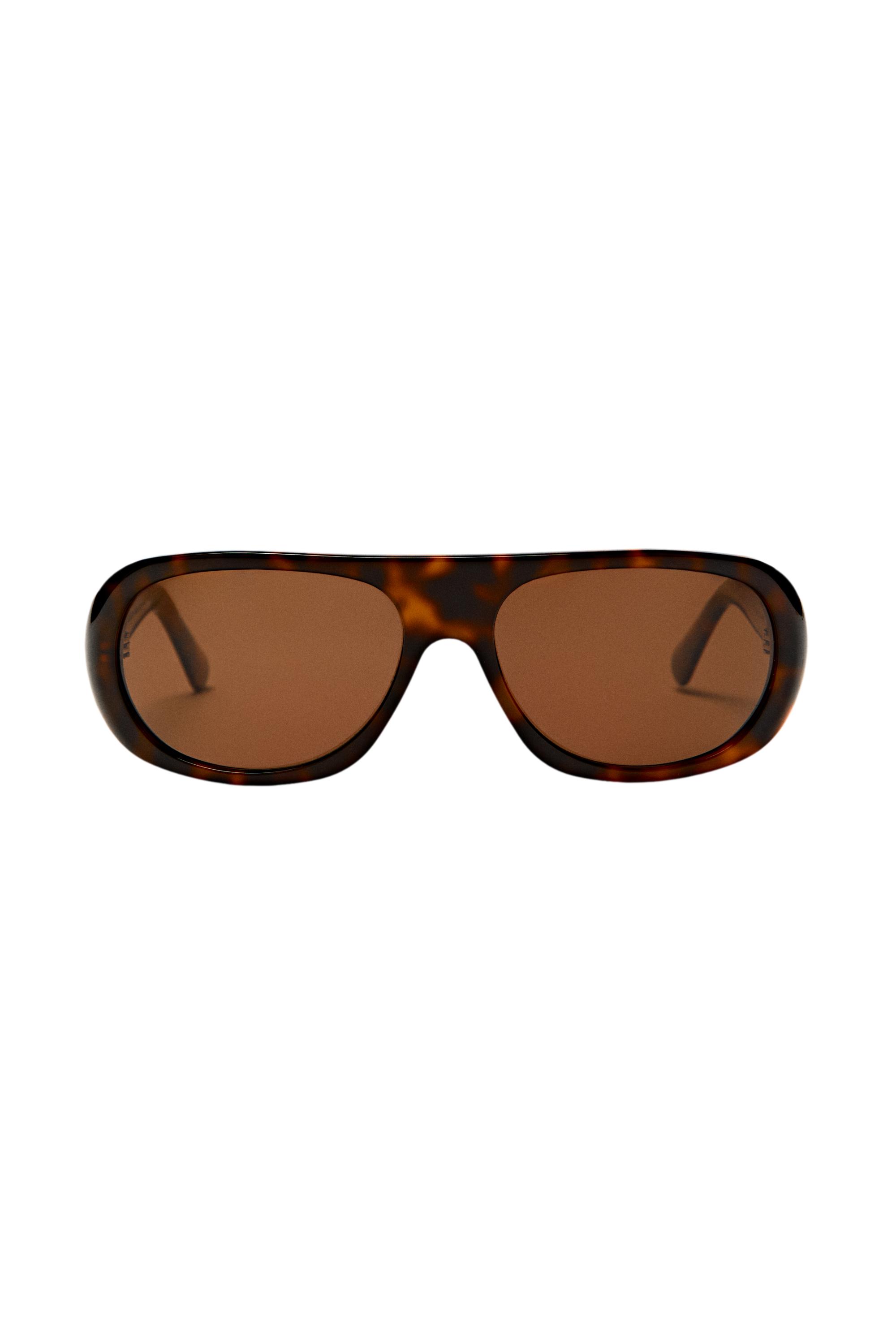 Oval tortoiseshell-effect sunglasses — Brown