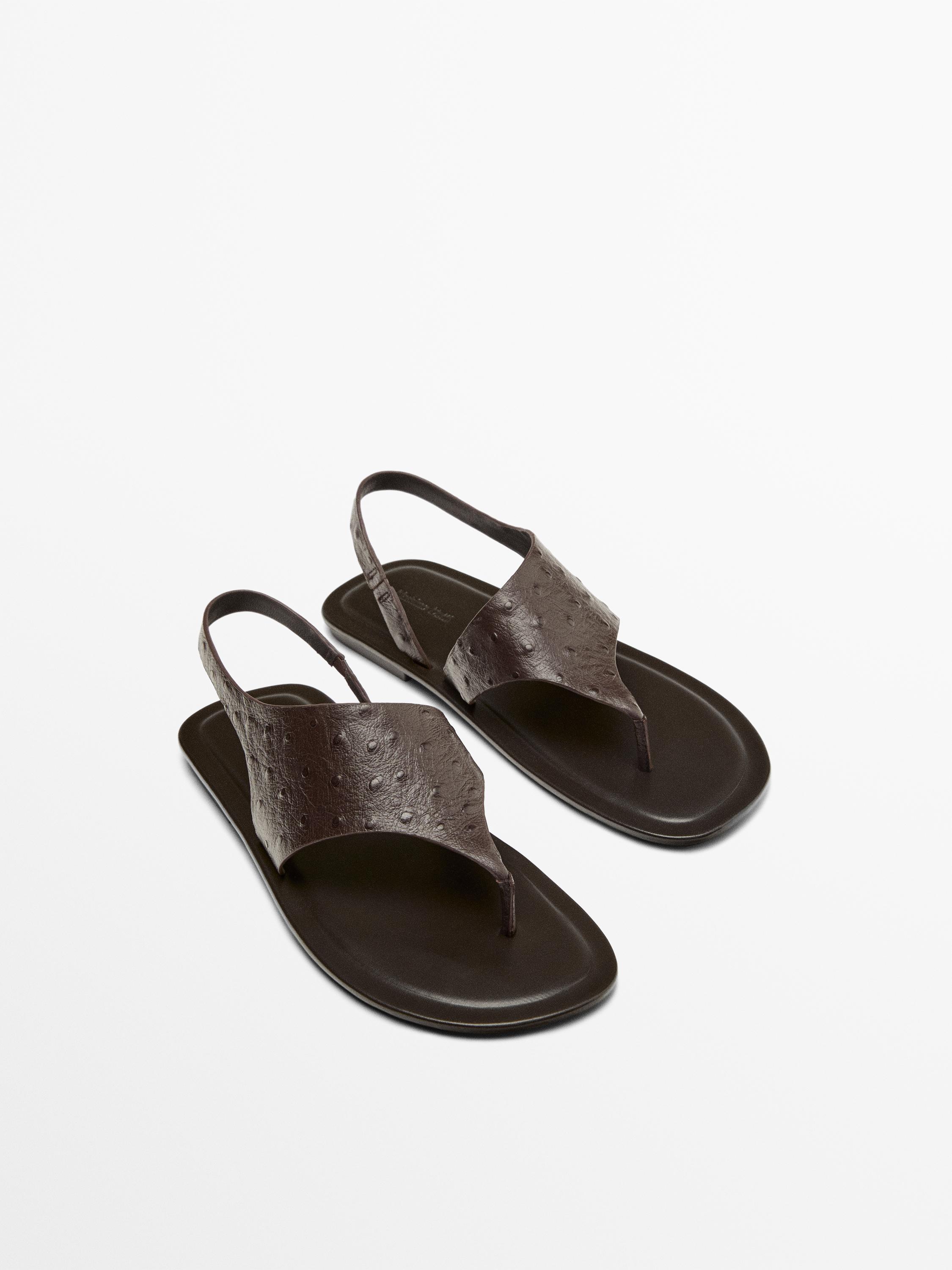 Embossed animal print sandals