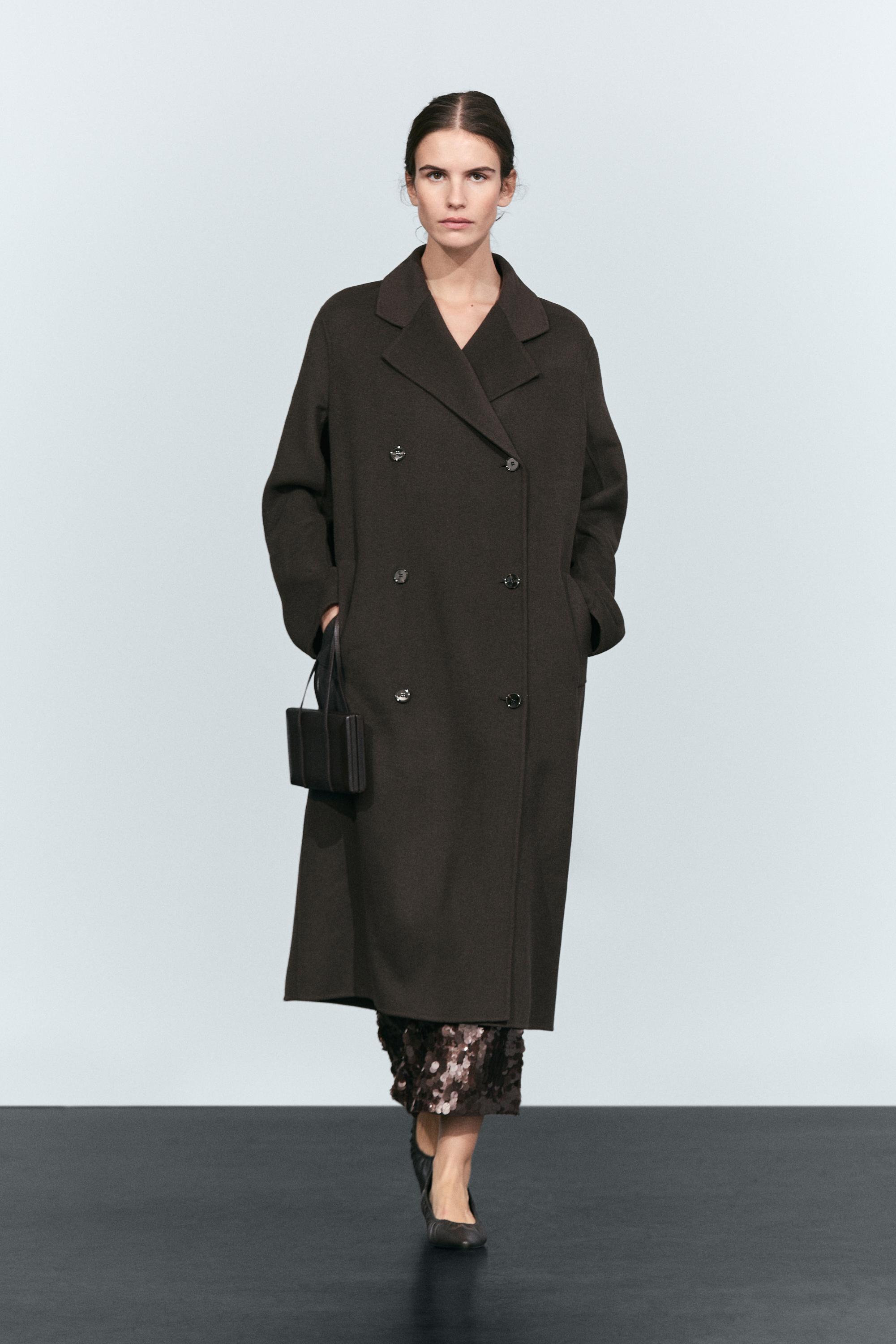 Manteau long croisé détail ceinture