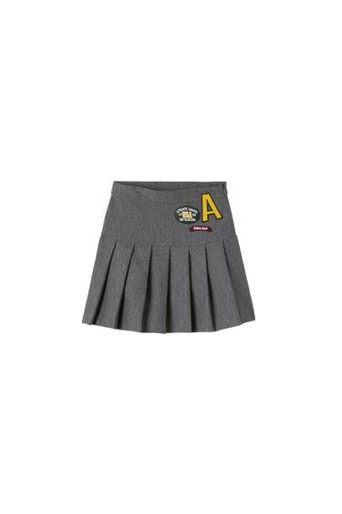BOX PLEAT SKIRT WITH PATCH