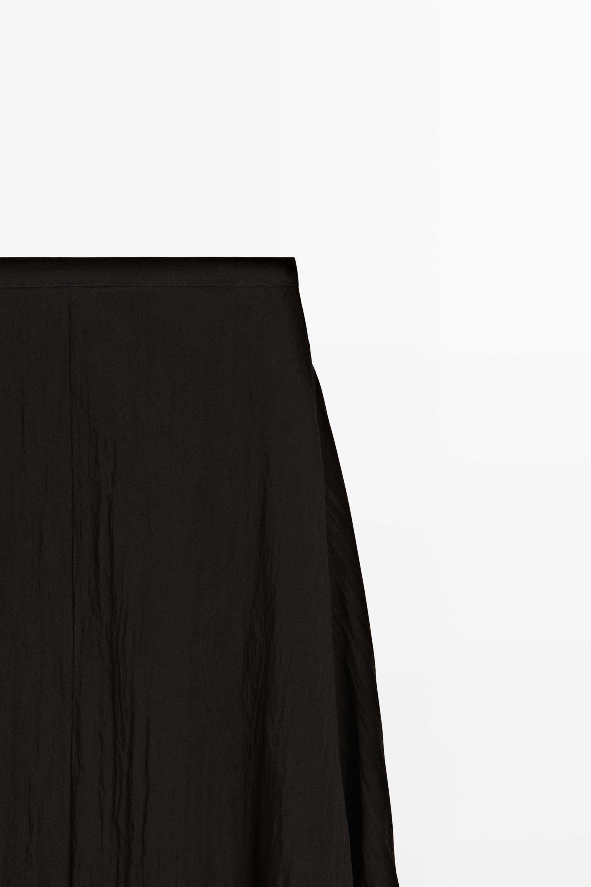 Jupe midi fluide à panneaux asymétriques
