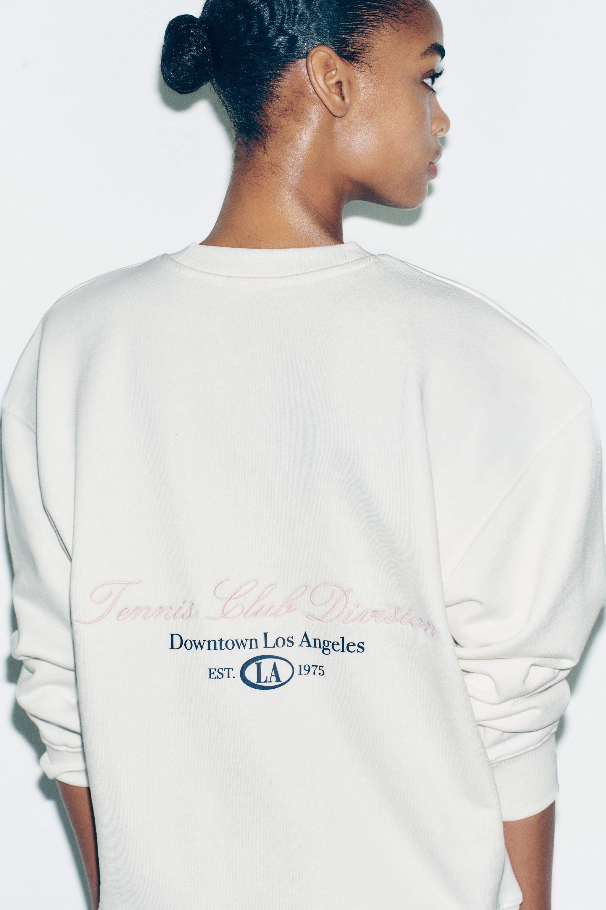COTTON SWEATSHIRT WITH SLOGAN