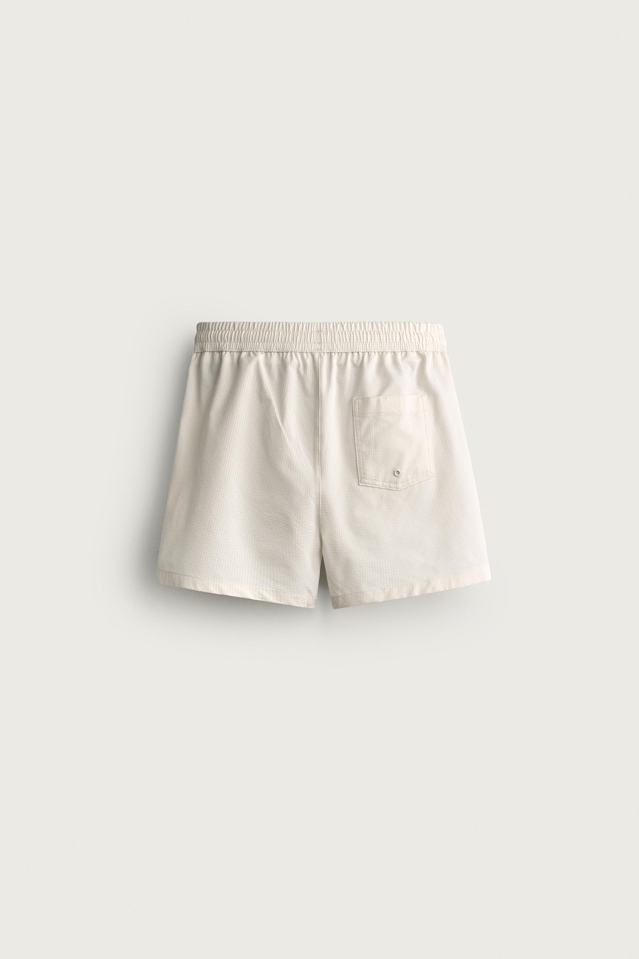 MID-LENGTH SEERSUCKER SWIMSUIT