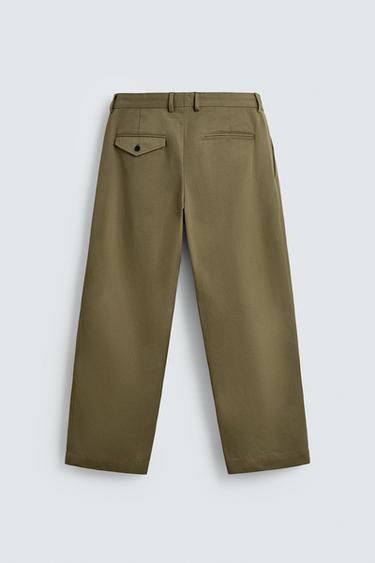 PANTALON CHINO À PLIS AARON LEVINE X ZARA - Kaki de Zara - Image 7