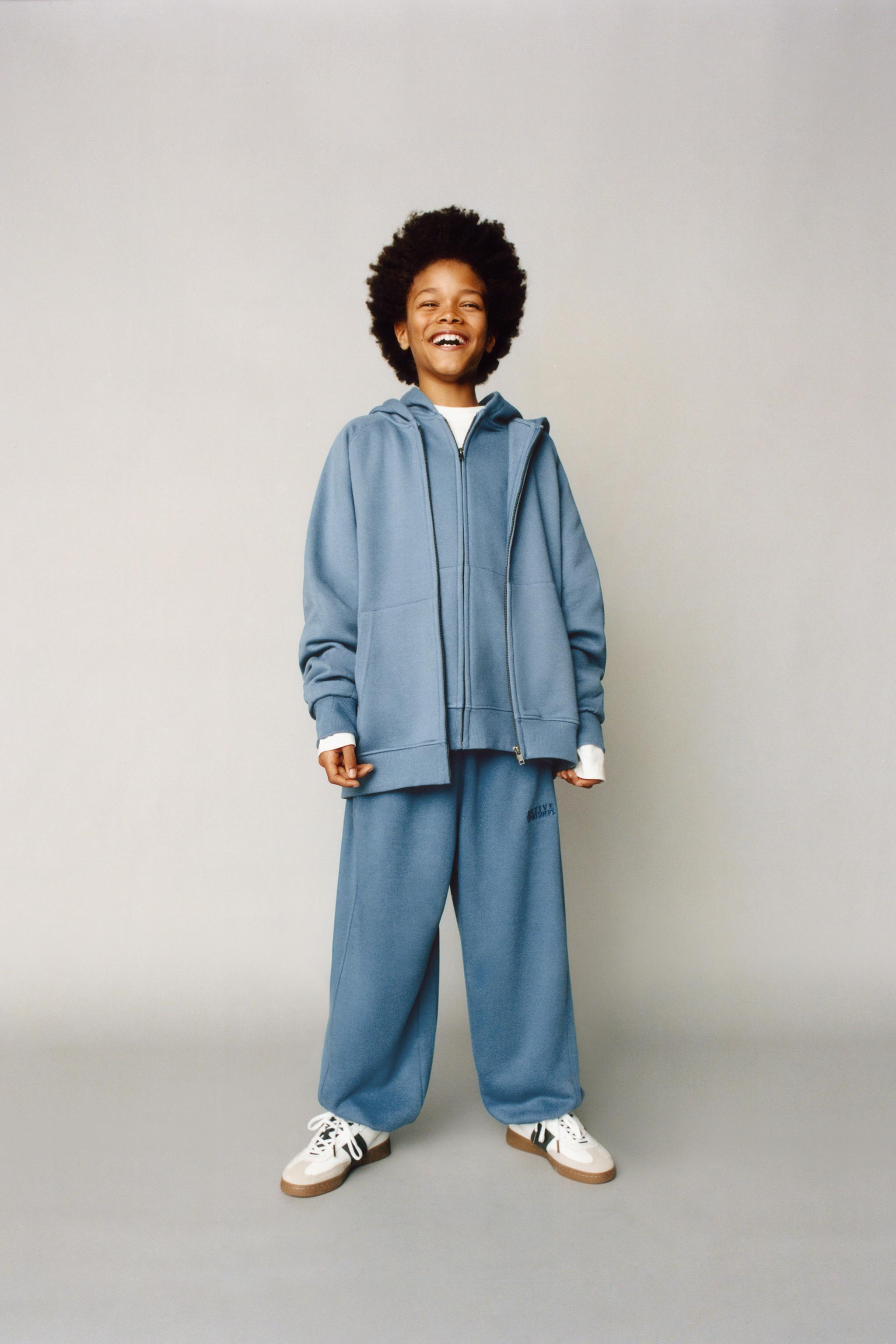 SWEAT À CAPUCHE ZIPPÉ