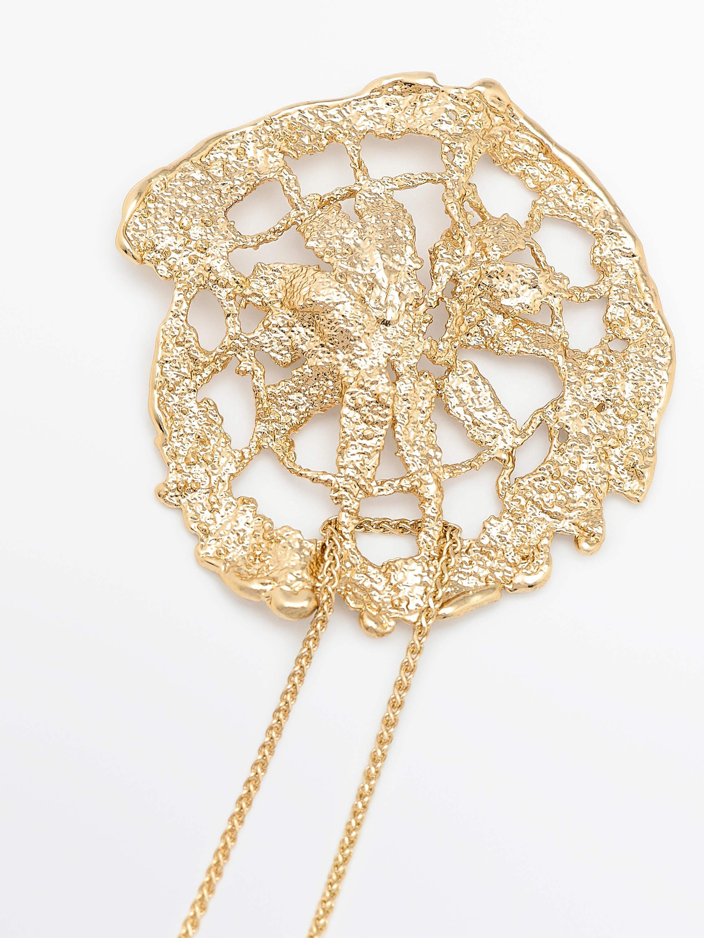 Necklace with lace piece pendant