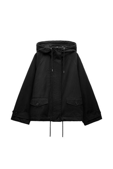 Front view of a black jacket with hood and flap pockets.