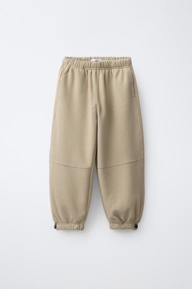 SPORTY JOGGER PANTS WITH STOPPERS — Sand 2