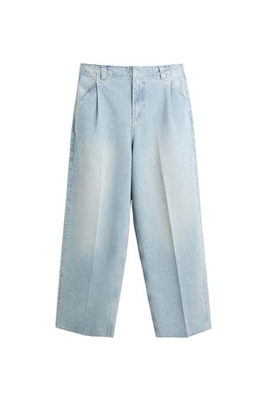 Light blue wide-leg jeans with a washed effect and front pleats on a white background.