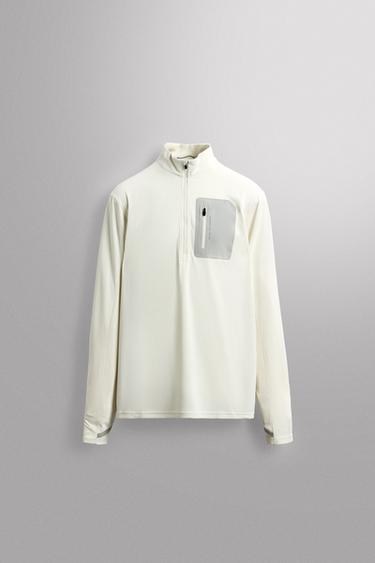 تيشرت تقني بياقة بسحاب - أبيض مكسور الخاص بـ Zara