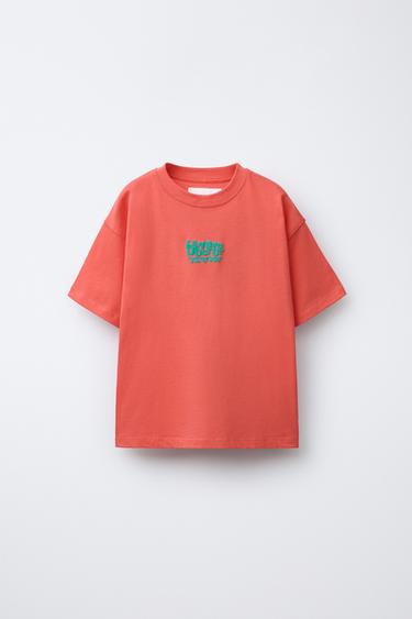 T-SHIRT WITH RAISED SLOGAN - Coral by Zara