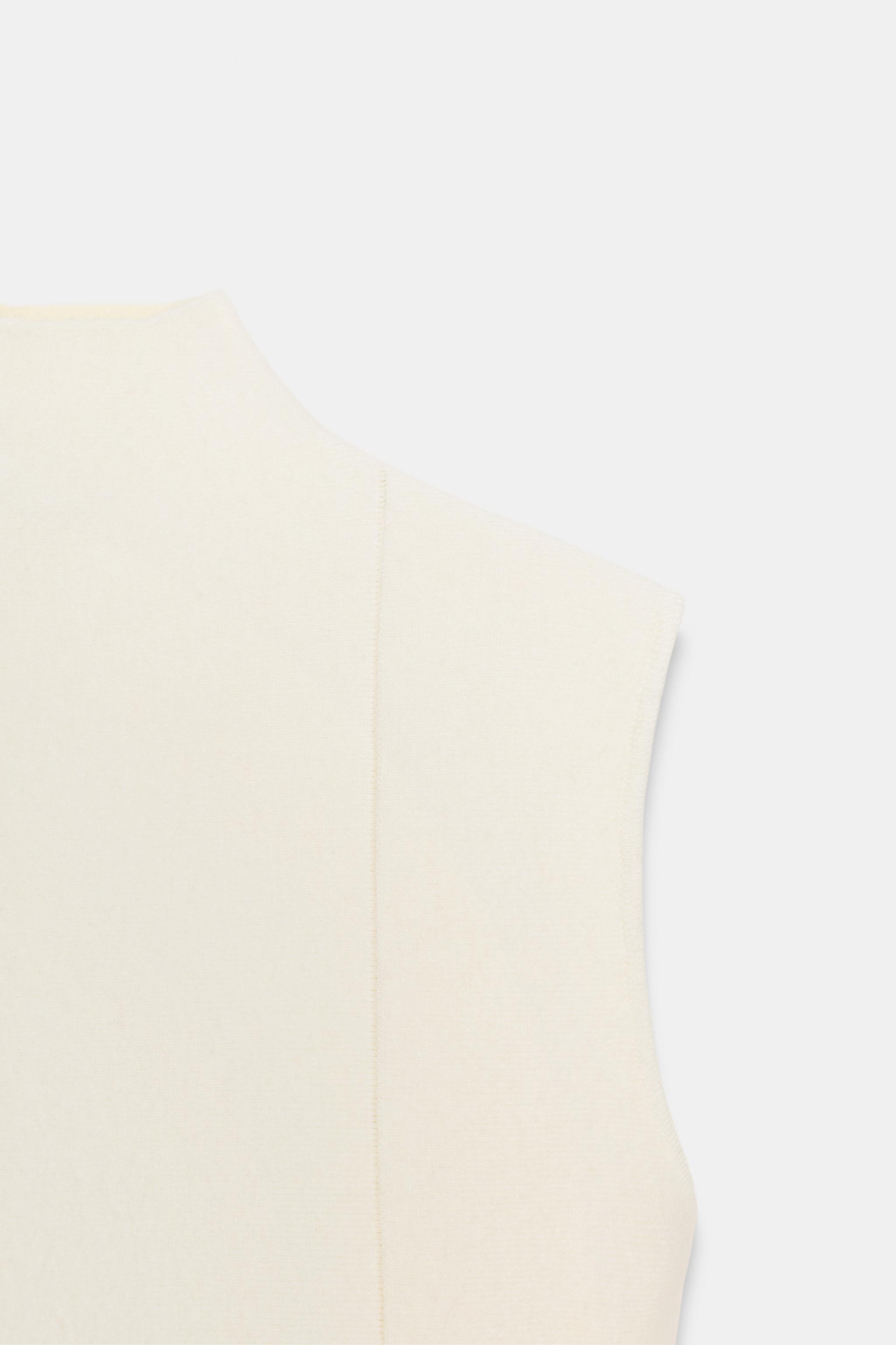 TOP EN MAILLE PÉPLUM